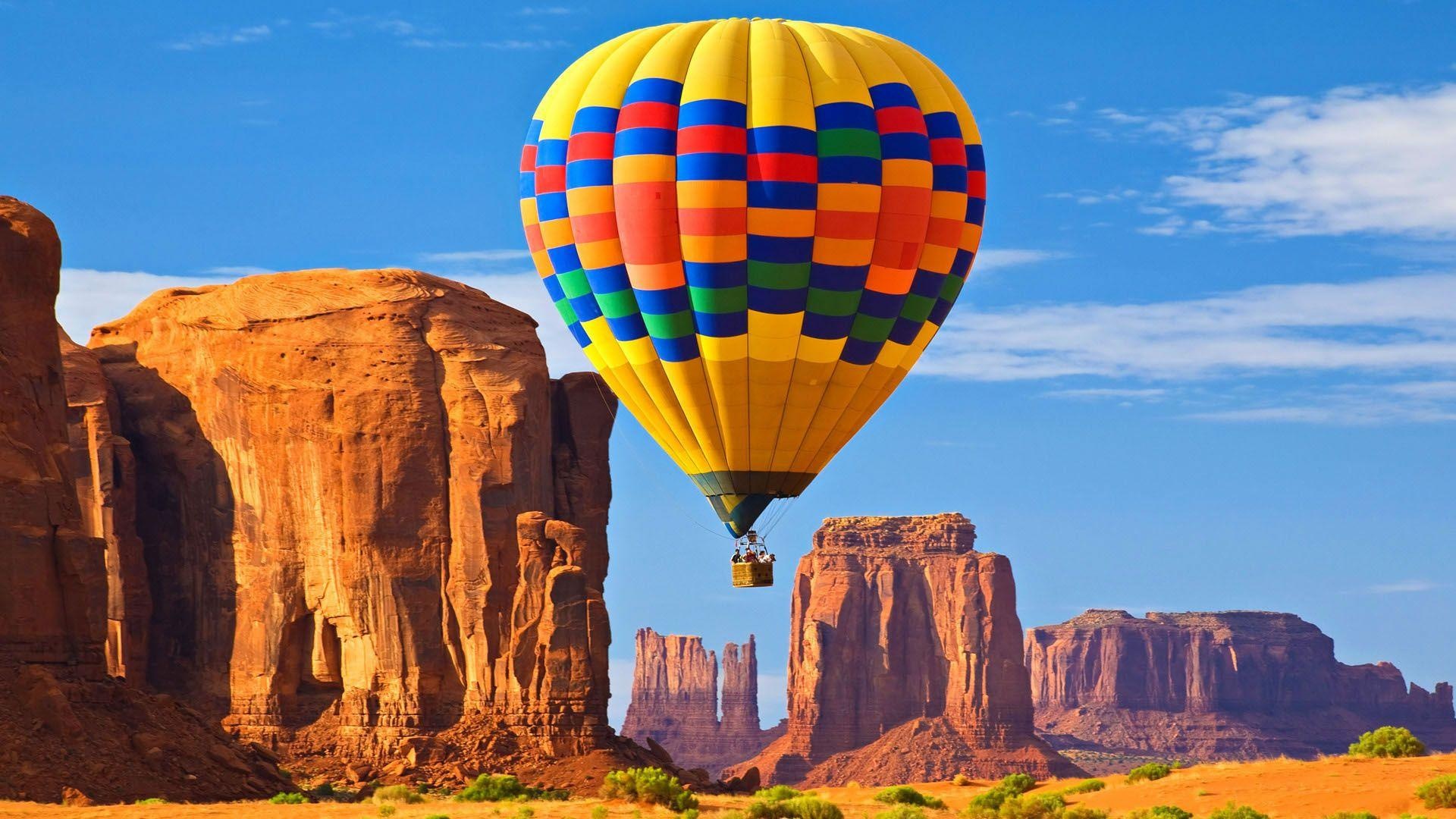 Hot Air Balloon: Arizona-Utah Border, Monument Valley, The Scenery Of An Old Western Movie. 1920x1080 Full HD Background.