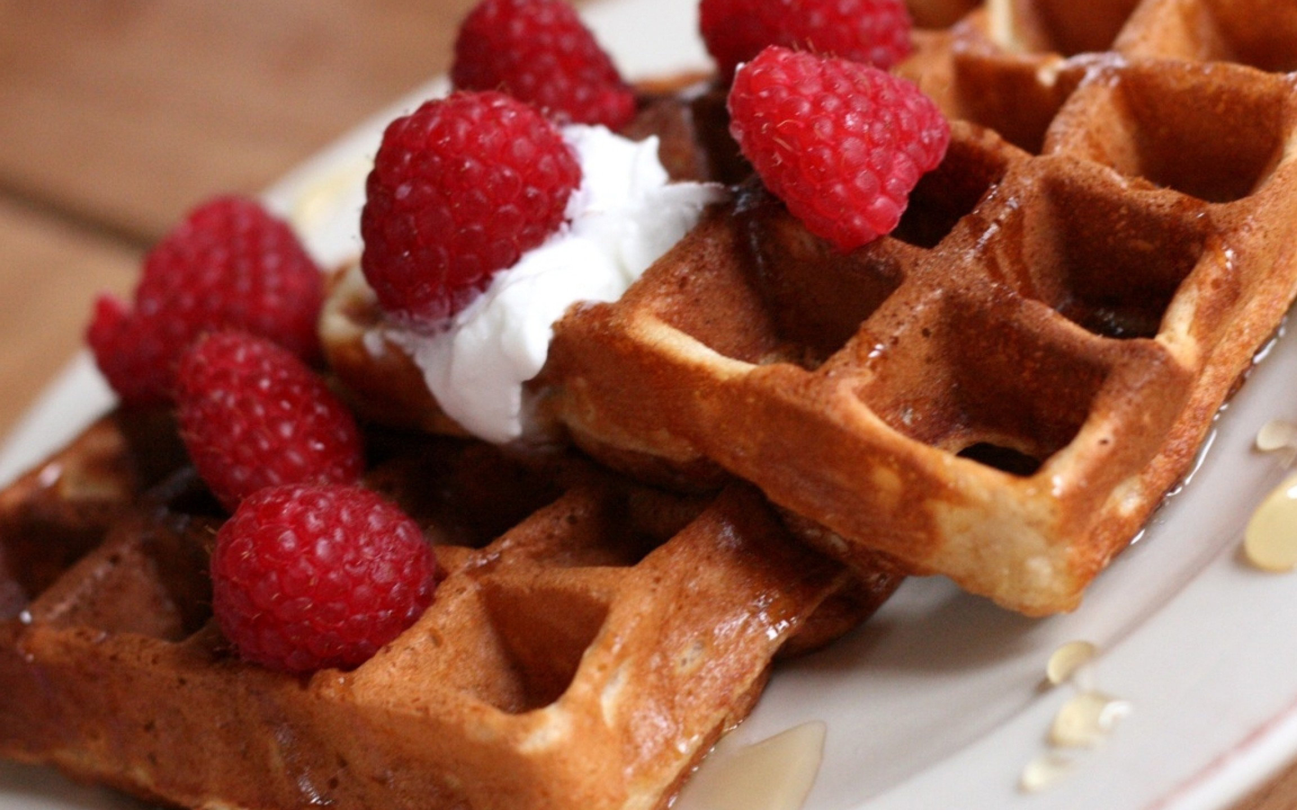 Waffle: Battercake, made by mixing a runny batter and pressing it in a specially designed iron. 2560x1600 HD Background.