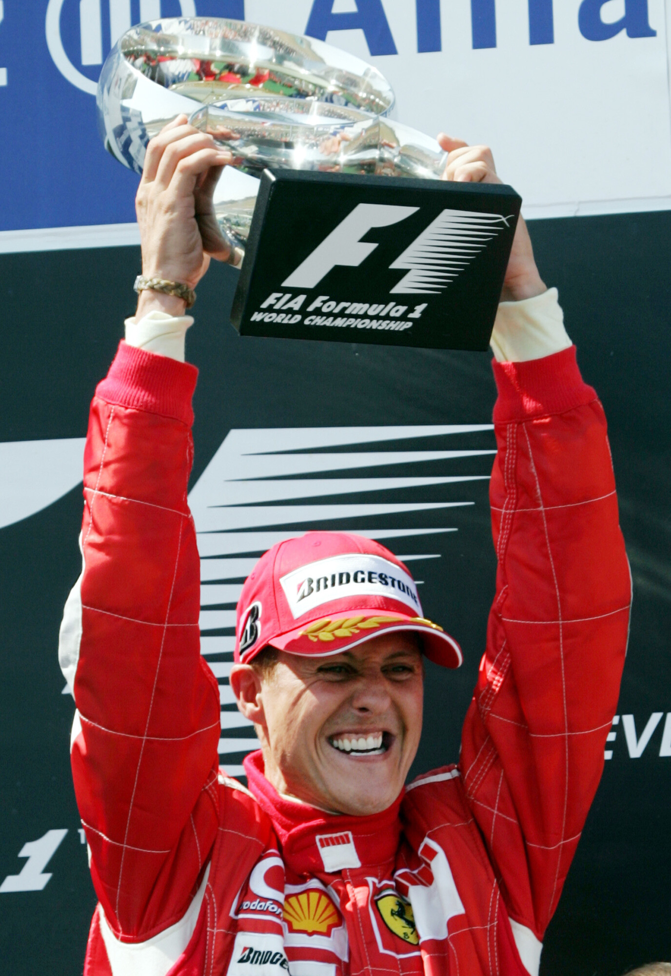 Michael Schumacher: He and Ferrari won five consecutive titles from 2000 to 2004. 1380x2000 HD Wallpaper.
