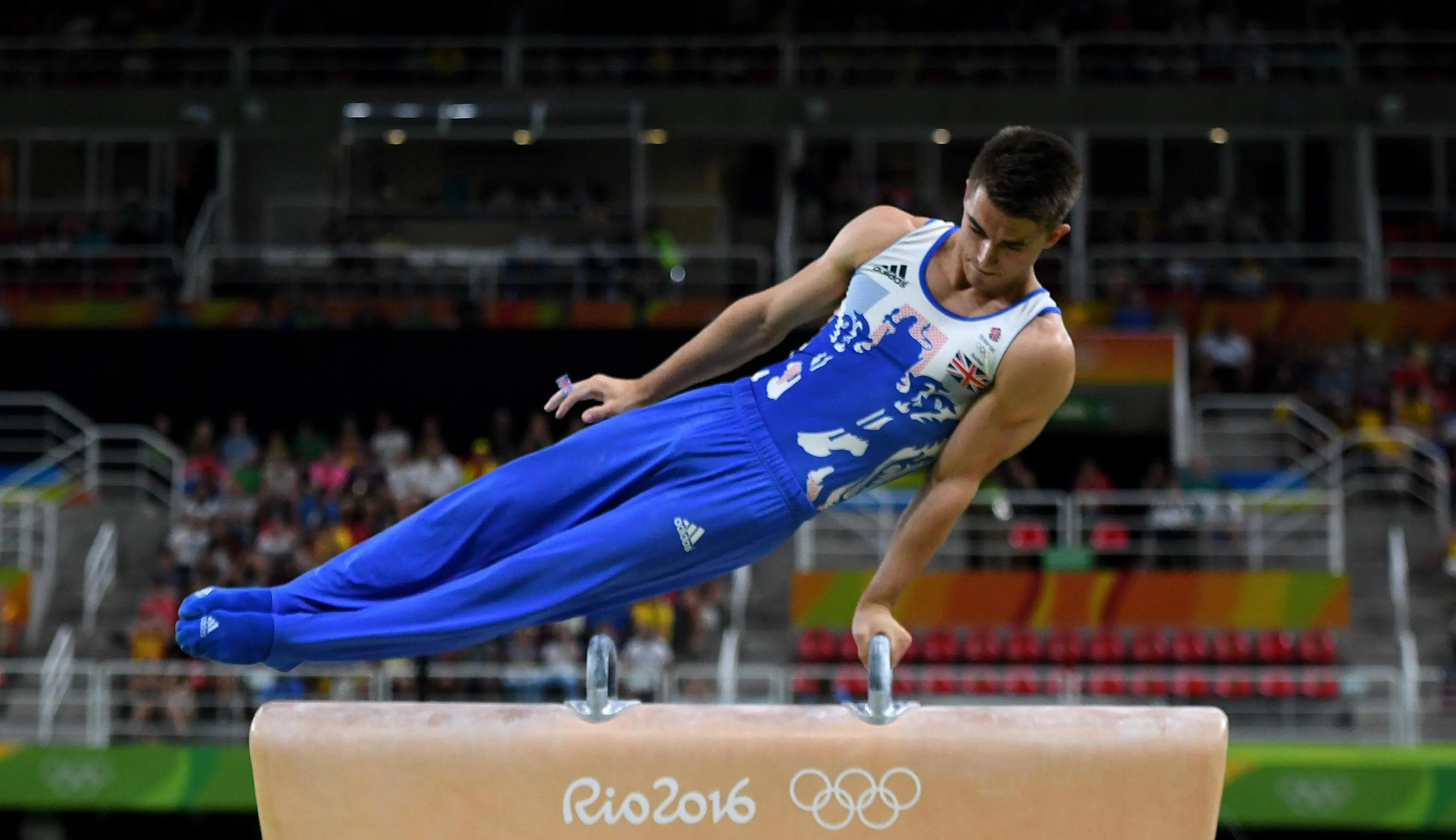 Pommel Horse (Gymnastics): Max Antony Whitlock, Rio, 2016, British artistic gymnast. 3170x1830 HD Background.