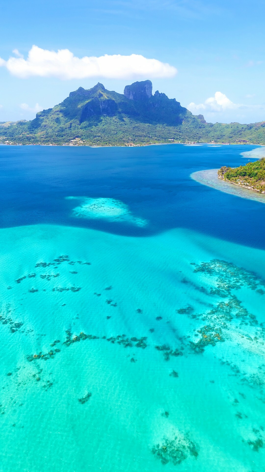 Tahiti: Bora-Bora, A volcanic island in the Society Islands archipelago, Ocean. 1080x1920 Full HD Background.