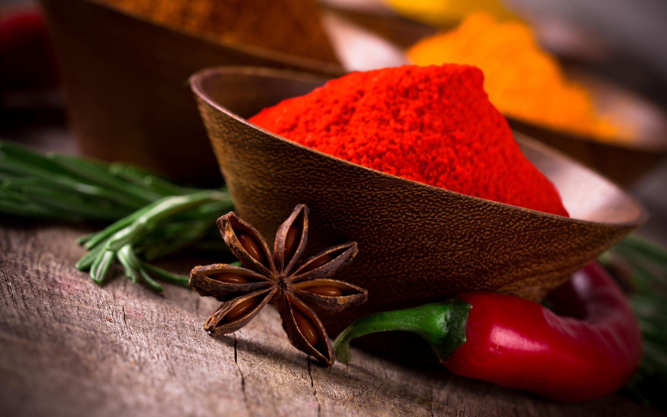 Spices: Paprika, A spice made from dried and ground red peppers, Star anise. 2560x1600 HD Background.