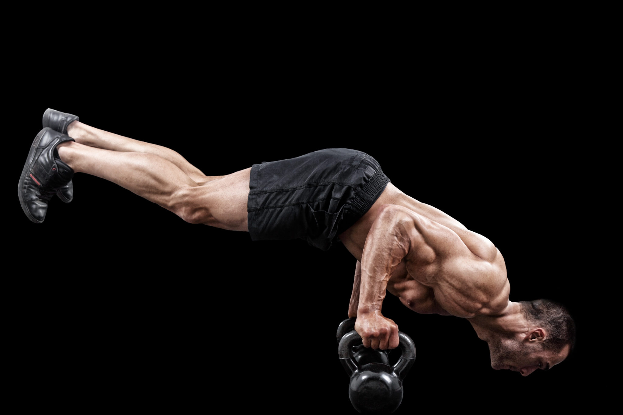 Calisthenics: Push-ups made by a professional using additional weight, Strength exercises. 2050x1370 HD Background.