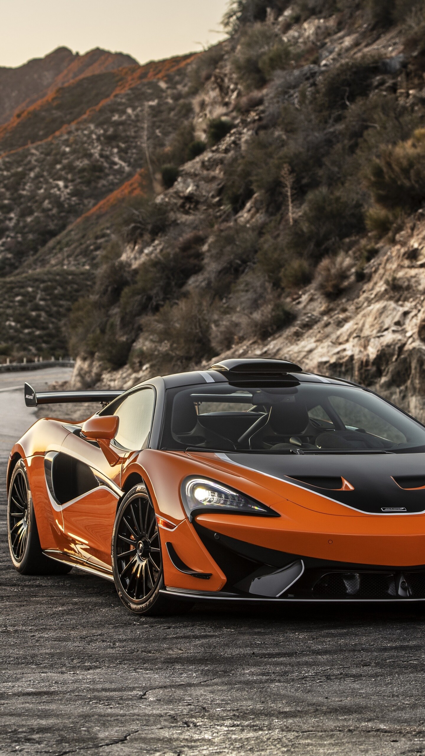 McLaren: 620R, Powered by a 3.8-liter twin-turbo V8 that produces 610 hp. 1440x2560 HD Wallpaper.