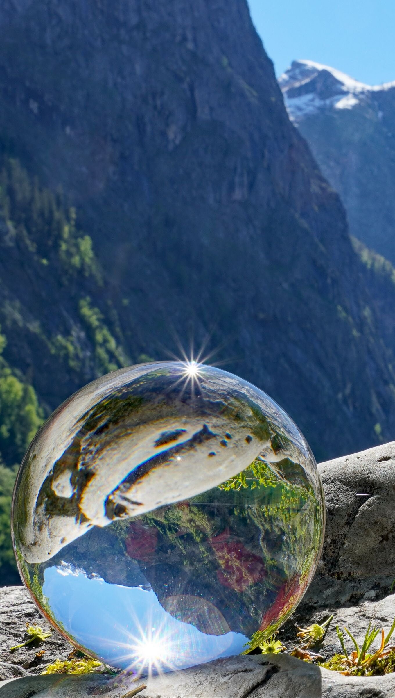 Glass: Transparent sphere reflecting the mountains, Natural landscape, Sunlight. 1360x2400 HD Wallpaper.