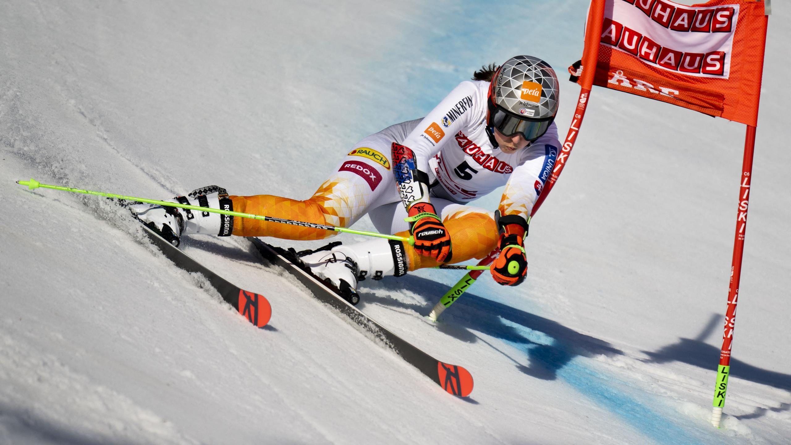 Skiing: Alpine Skiing, Petra Vlhova, Giant Slalom, Downhill in a wavy course. 2560x1440 HD Wallpaper.