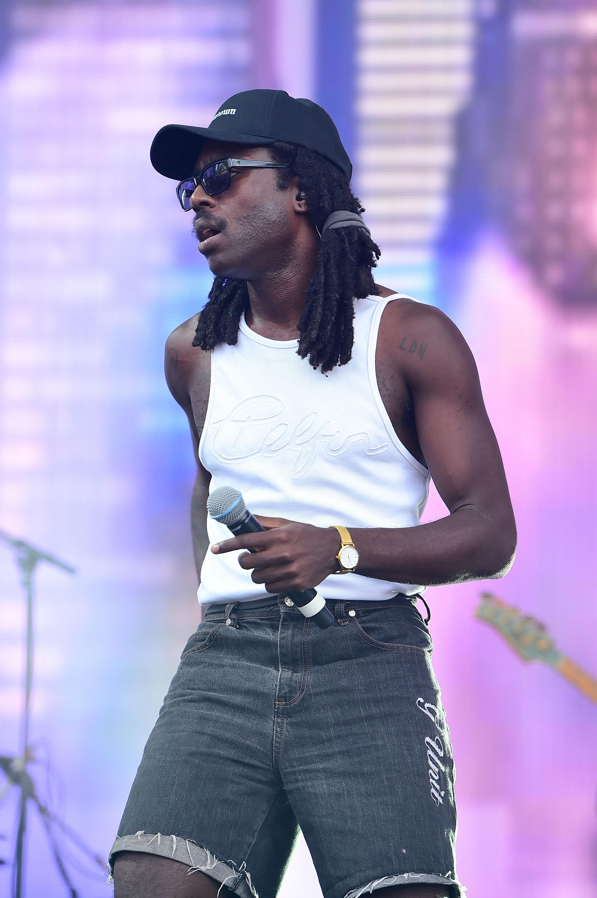 Dev Hynes' Panorama Festival stage, Tank top and cutoffs, Blood Orange's performance, Music festival experience, 2000x3000 HD Phone