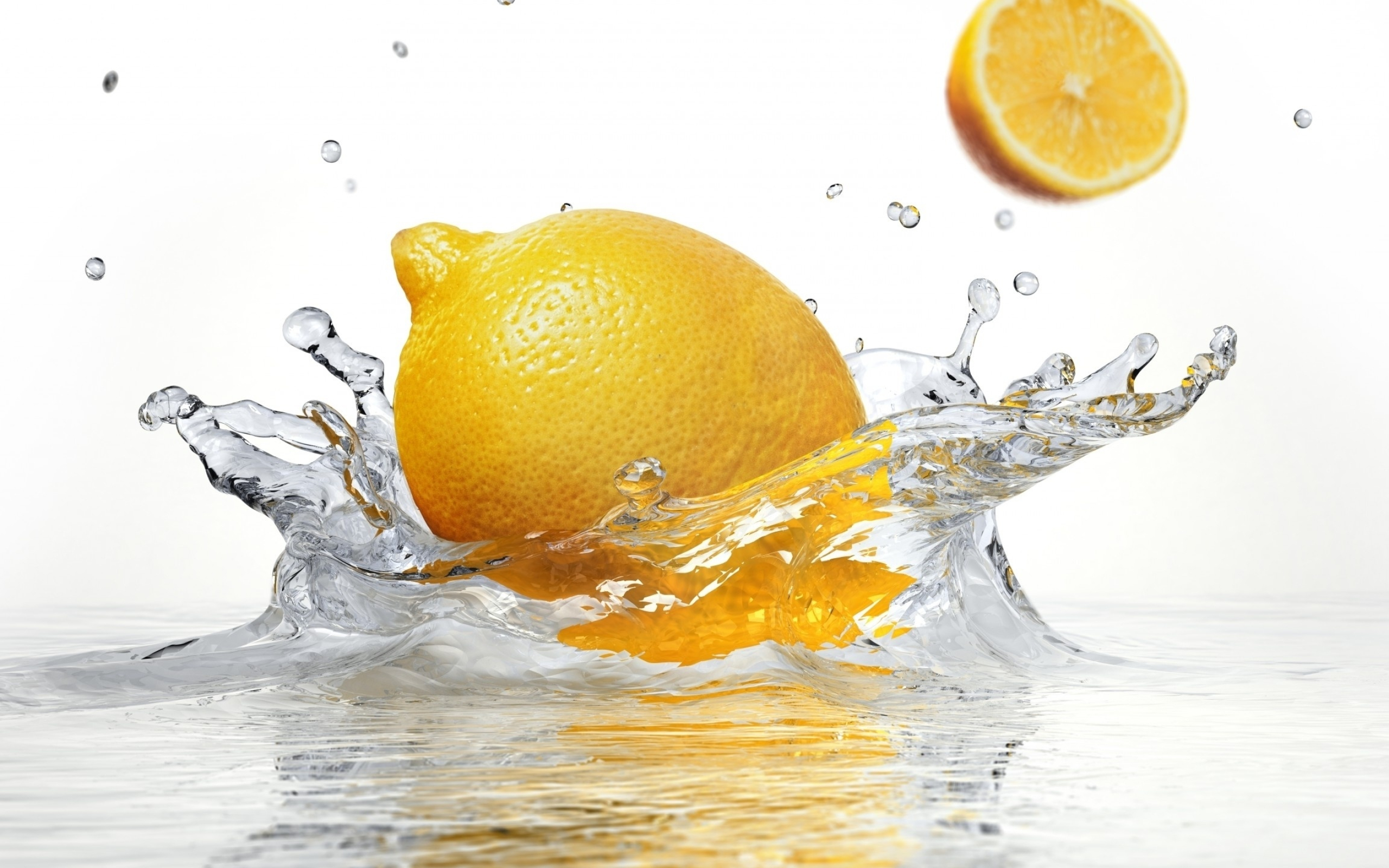 Lemon: Its juice contains slightly more citric acid than lime juice. 2560x1600 HD Background.