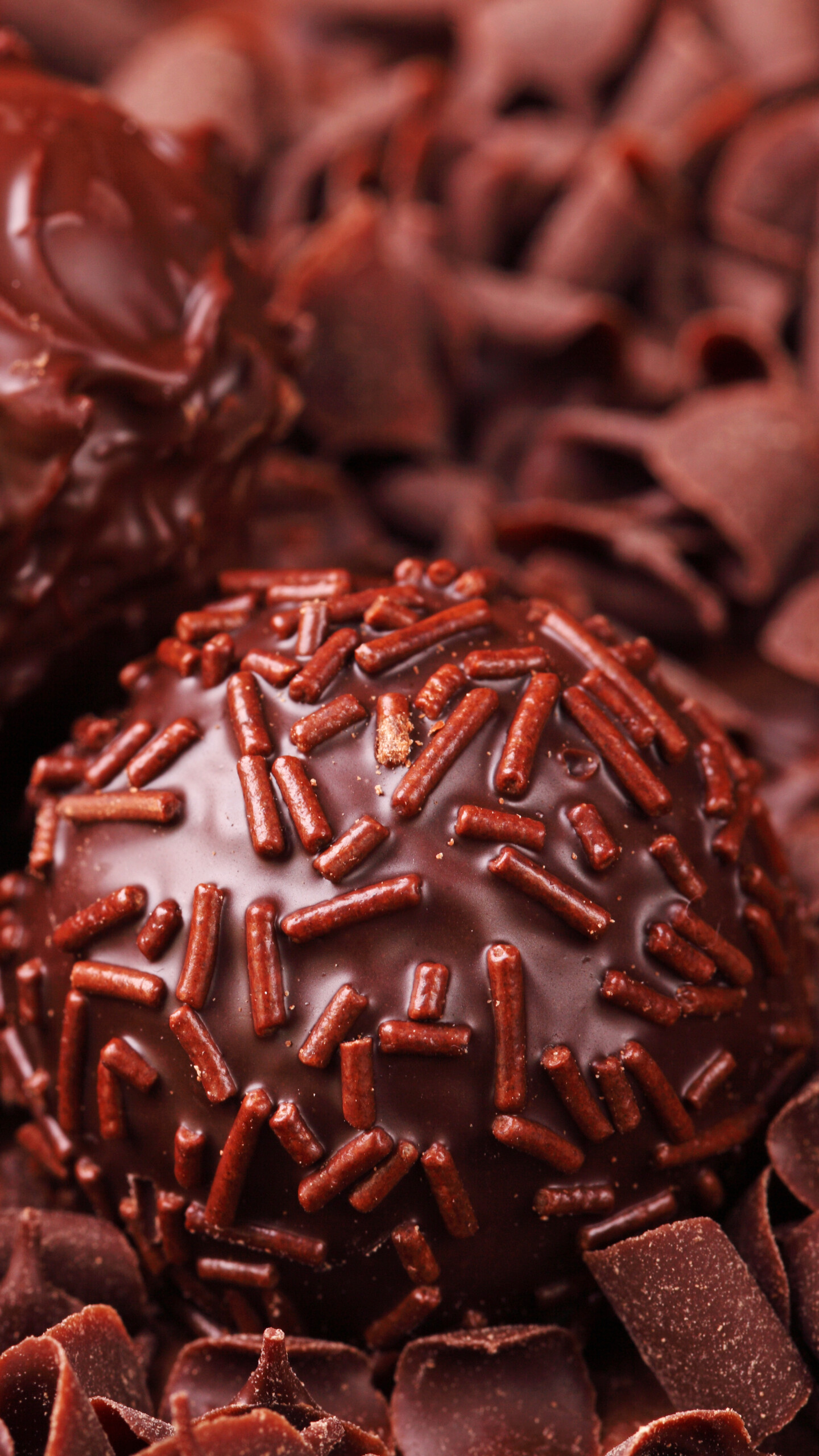 Sweets: Chocolate balls, A spherical confection made of or dipped into chocolate. 1440x2560 HD Background.