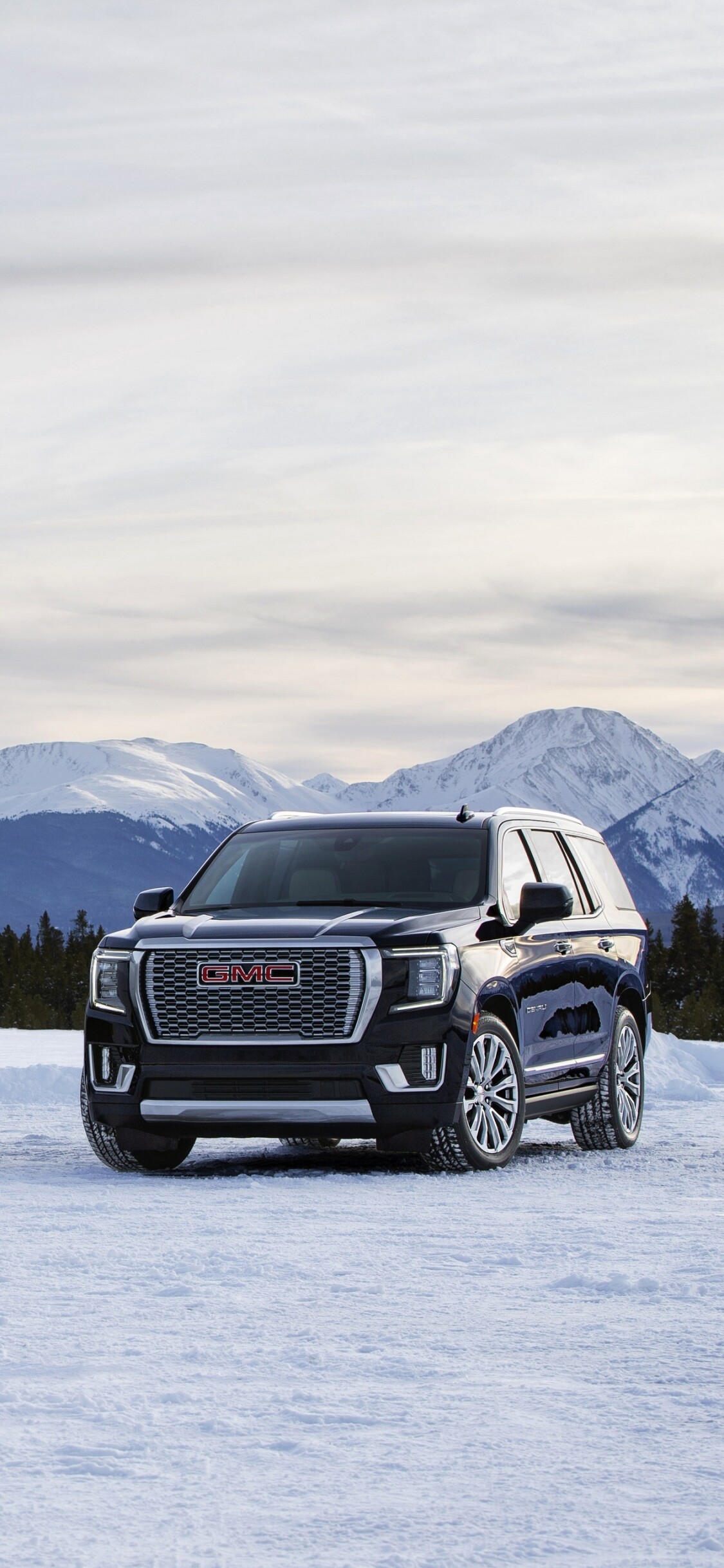 GMC: Vehicles GMC Yukon Denali, Designed for serious off-road action, Driving in the snow. 1130x2440 HD Wallpaper.