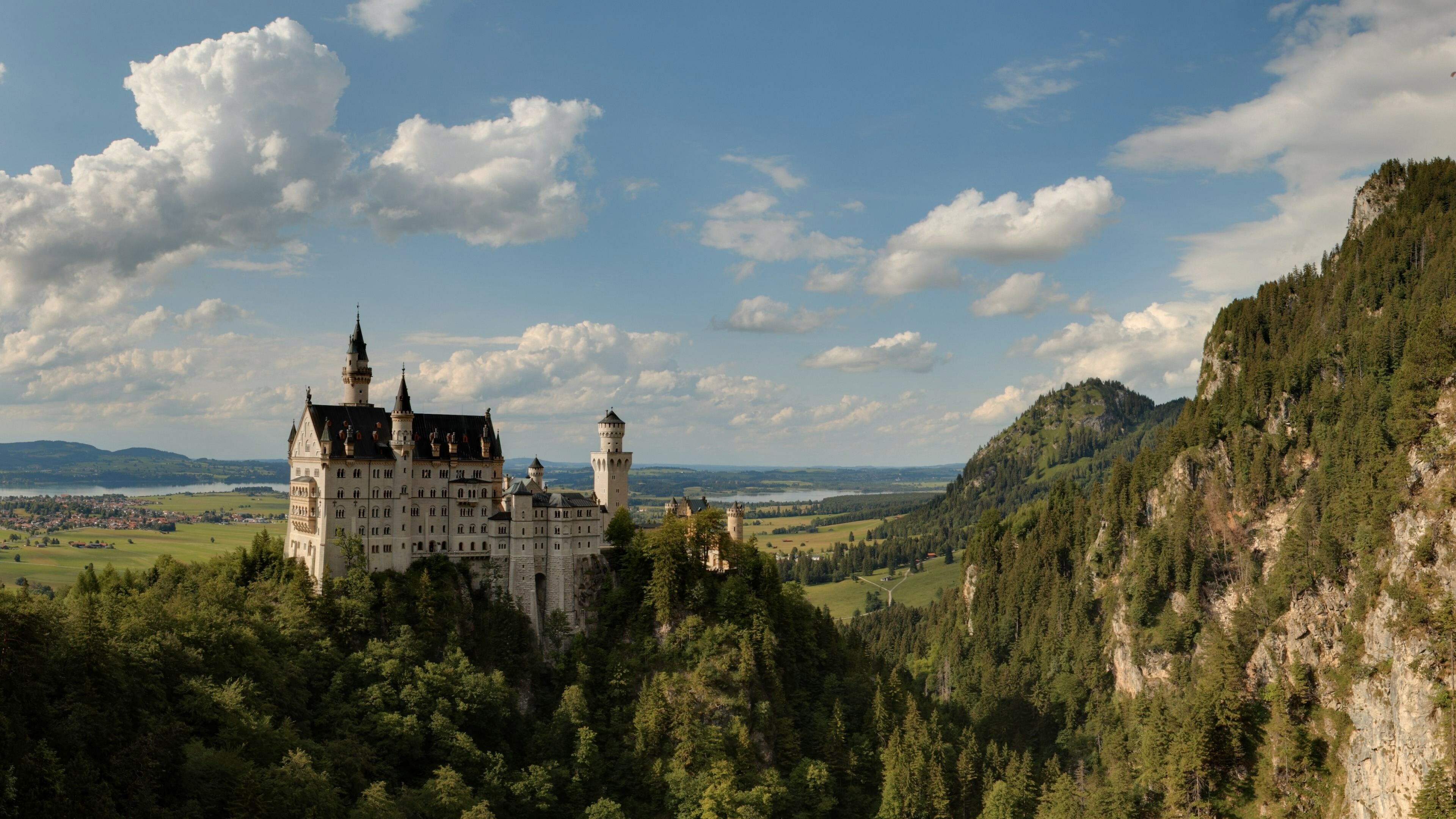 Neuschwanstein Castle: An elaborate palace near Fussen, Germany, Bavarian Alps. 3840x2160 4K Wallpaper.