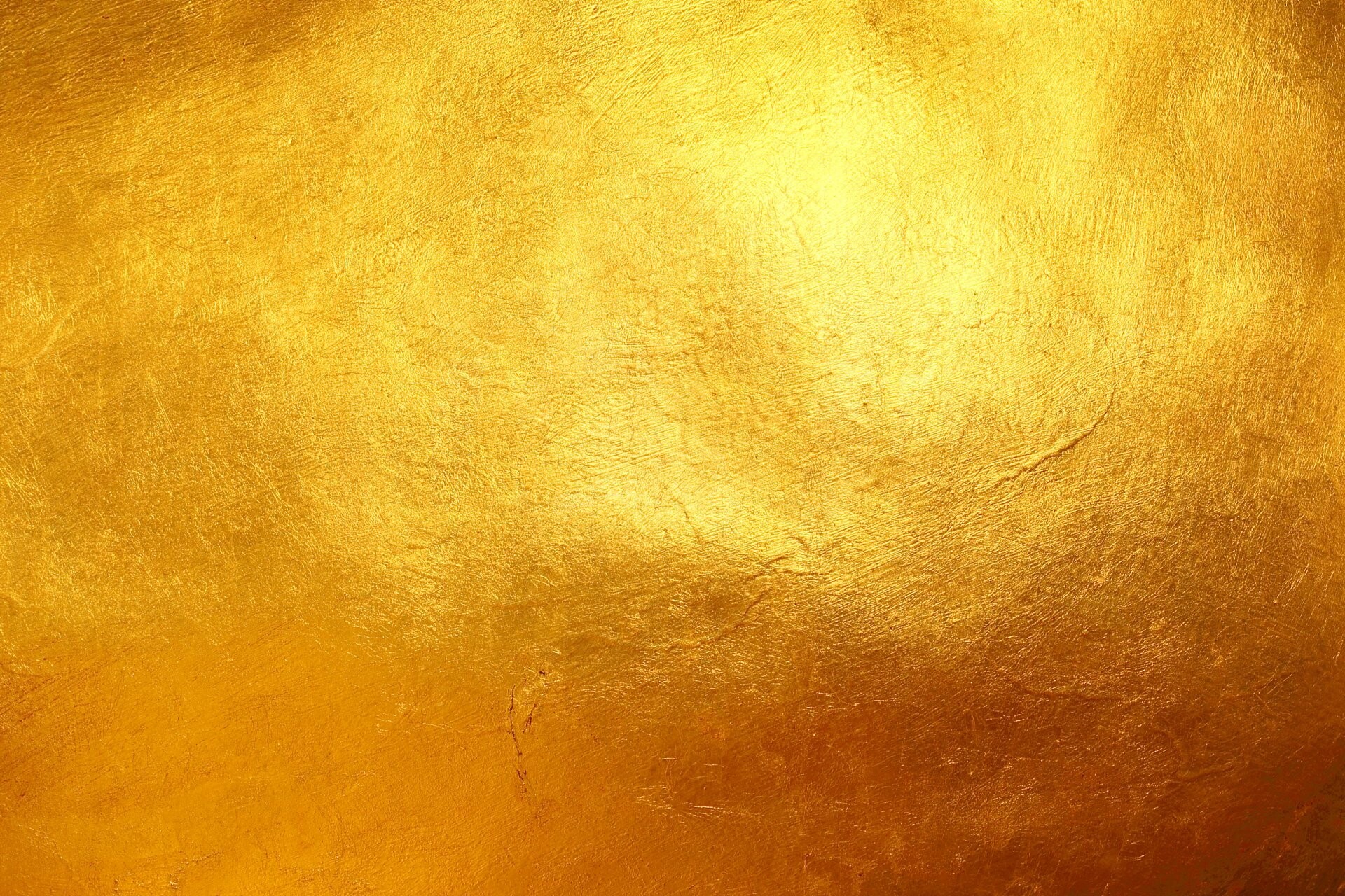 Gold Glitter: A decorative technique for applying a very thin coating of precious metal to solid surfaces. 1920x1280 HD Background.