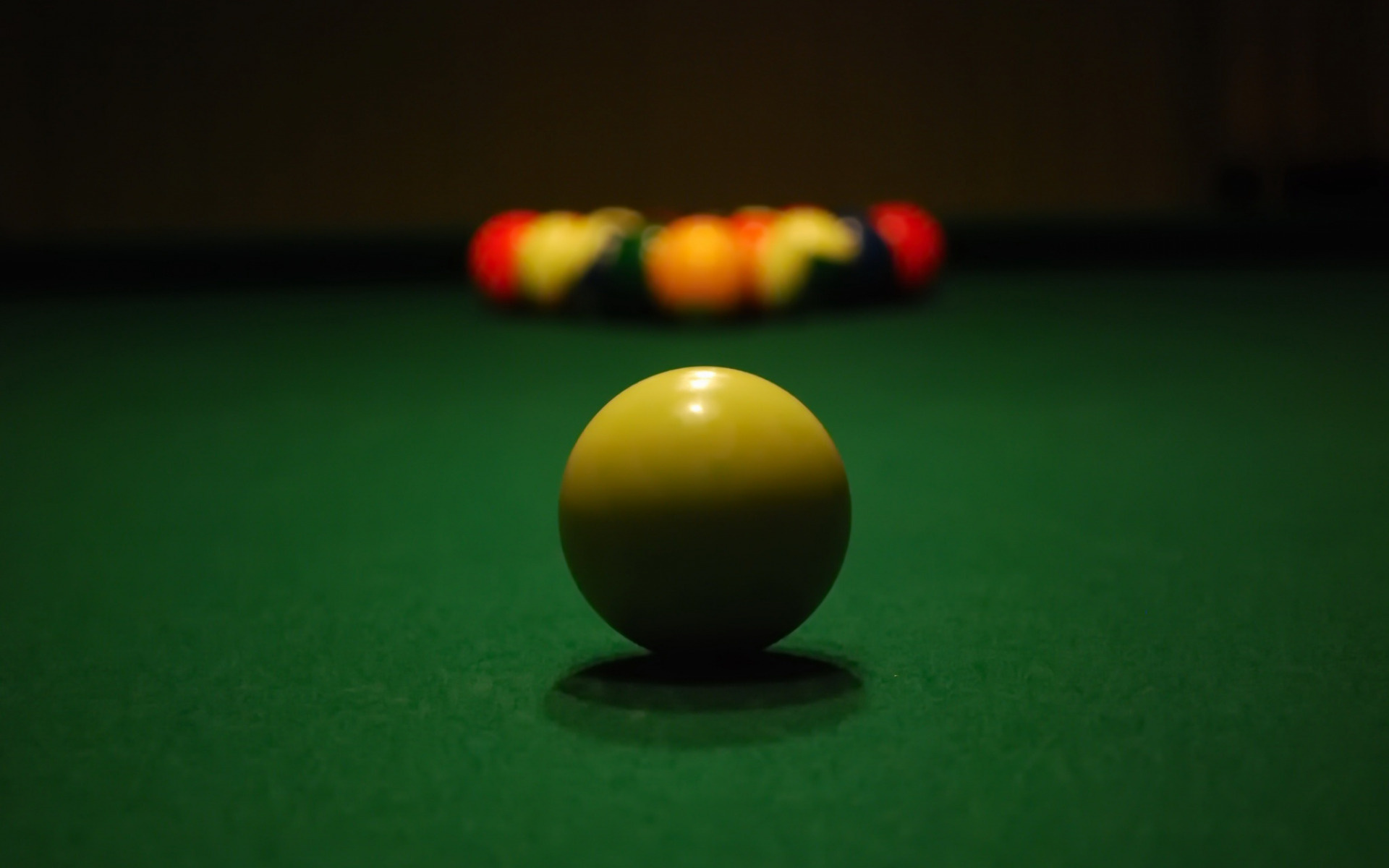 Billiards: A white cue ball before the break shot in a classic eightball type of a recreational sport. 1920x1200 HD Background.