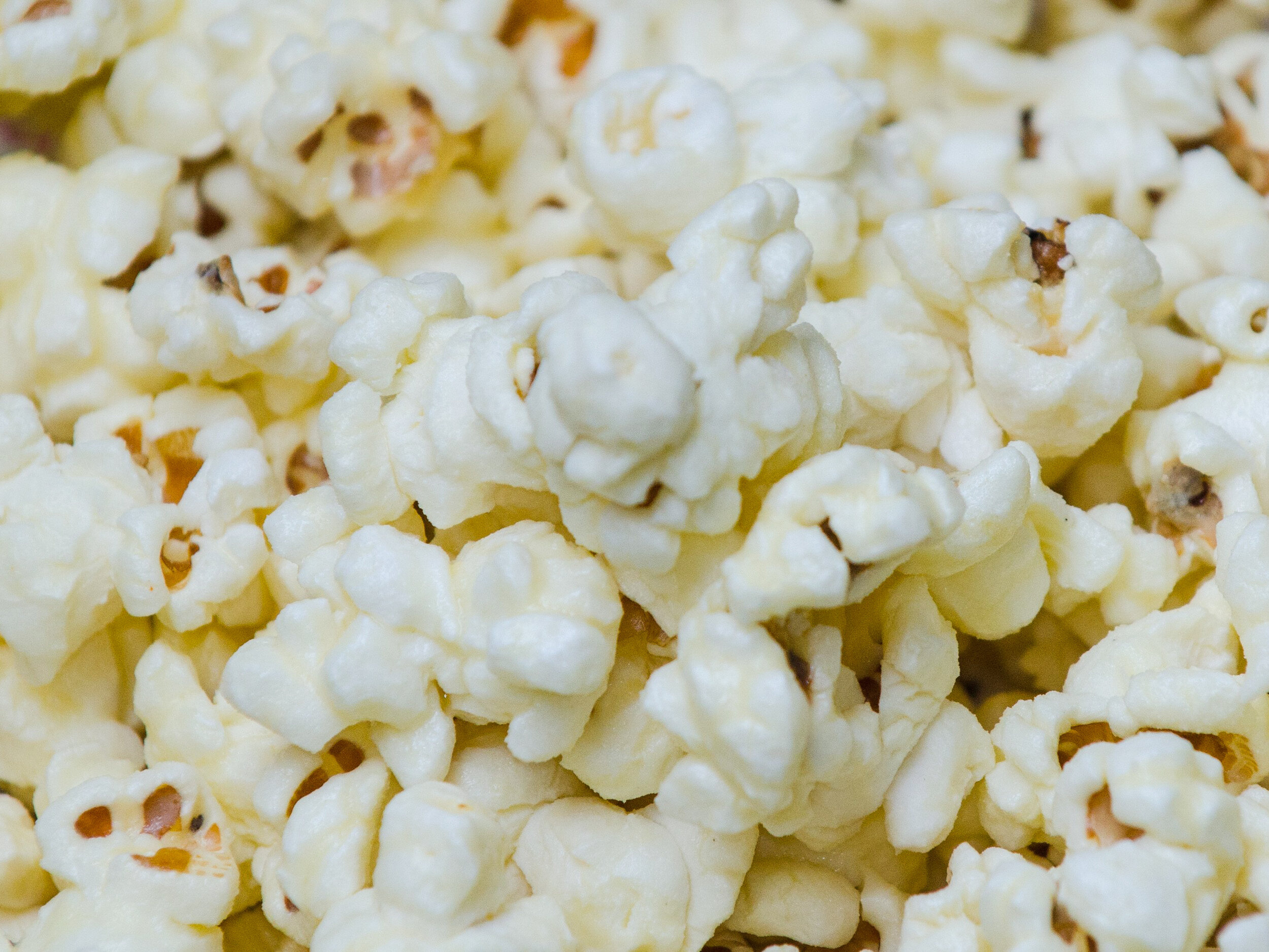 White cheddar popcorn, Creamy cheese goodness, Whimsical popcorn, Unique flavor twist, 2500x1880 HD Desktop
