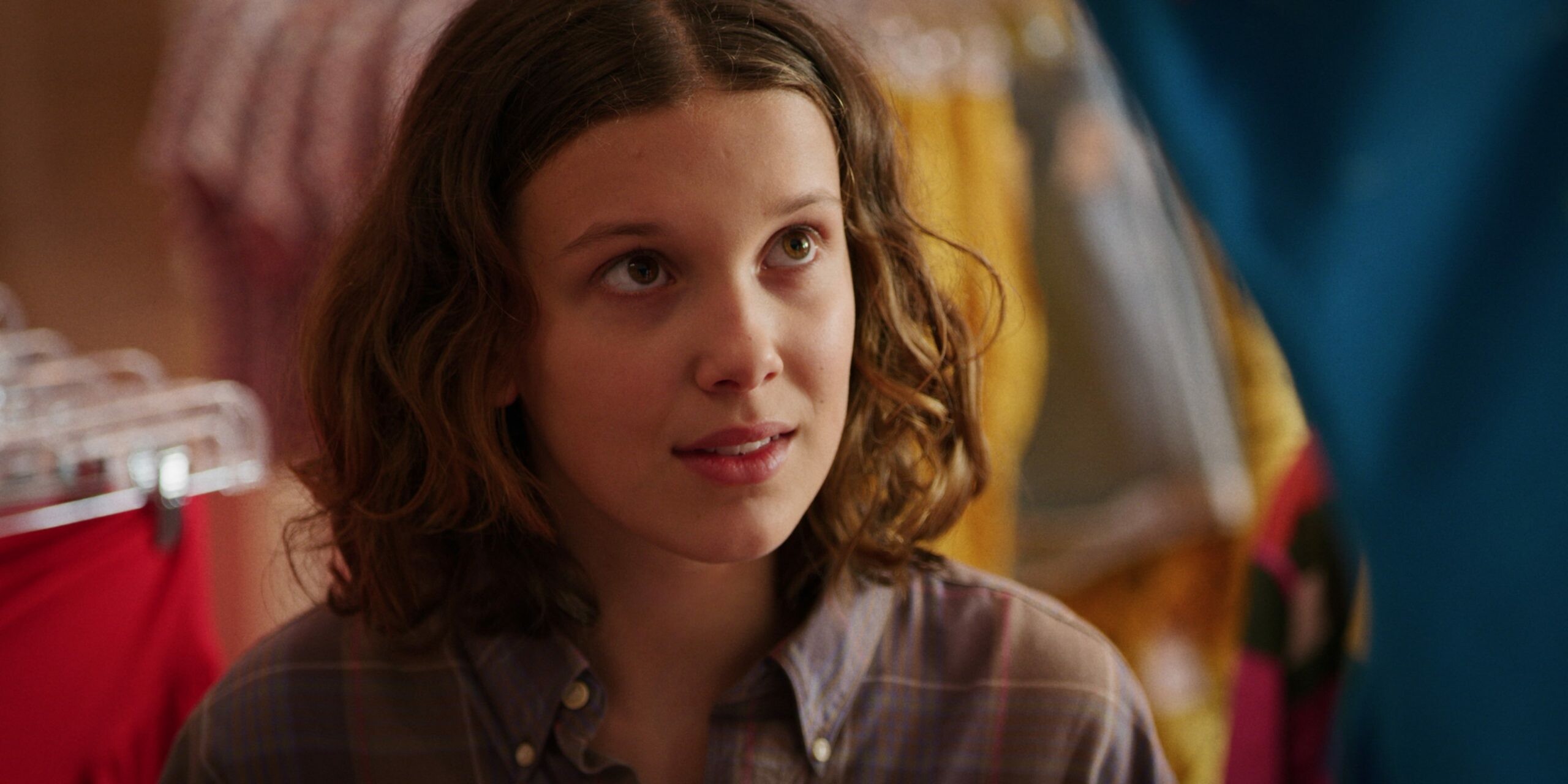 Stranger Things: Millie Bobby Brown as a young psychokinetic girl named Eleven. 2560x1280 Dual Screen Wallpaper.