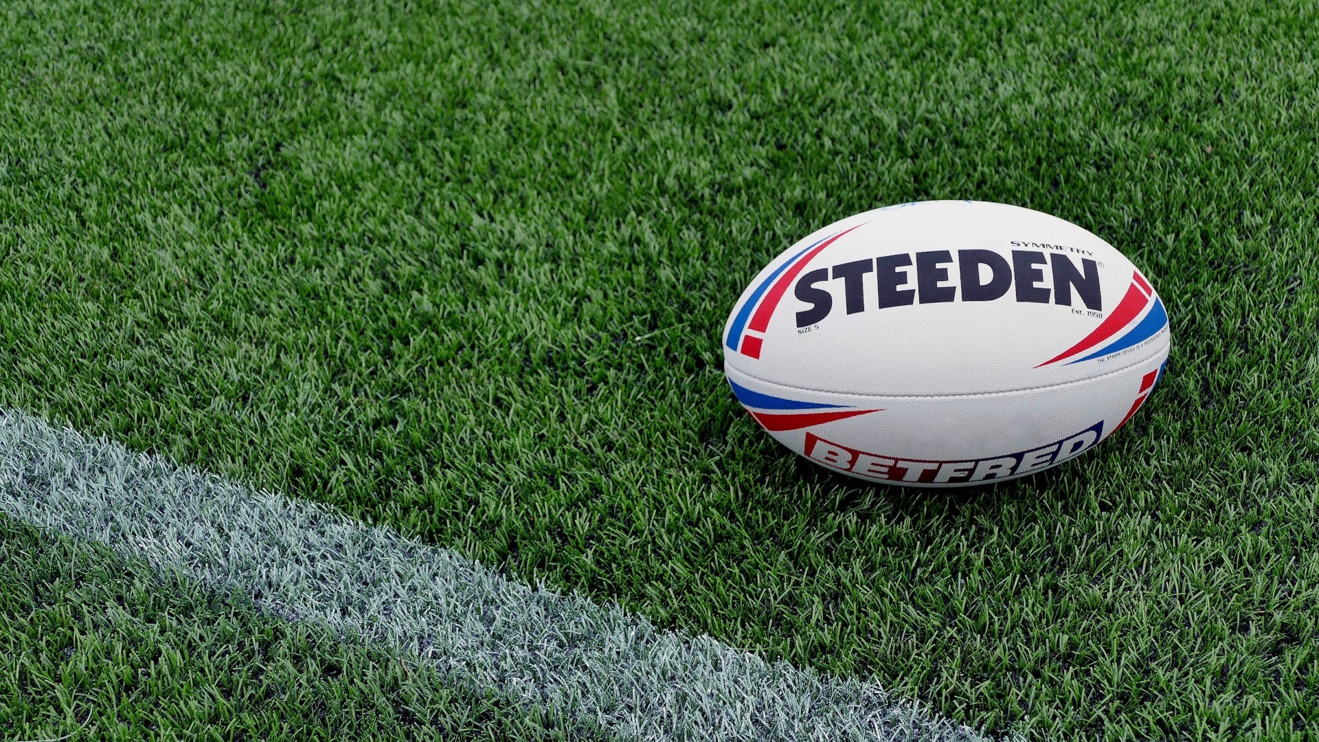 Rugby League: A standard gridiron football ball produced by Steeden, Equipment for a competitive ball sport. 1920x1080 Full HD Background.