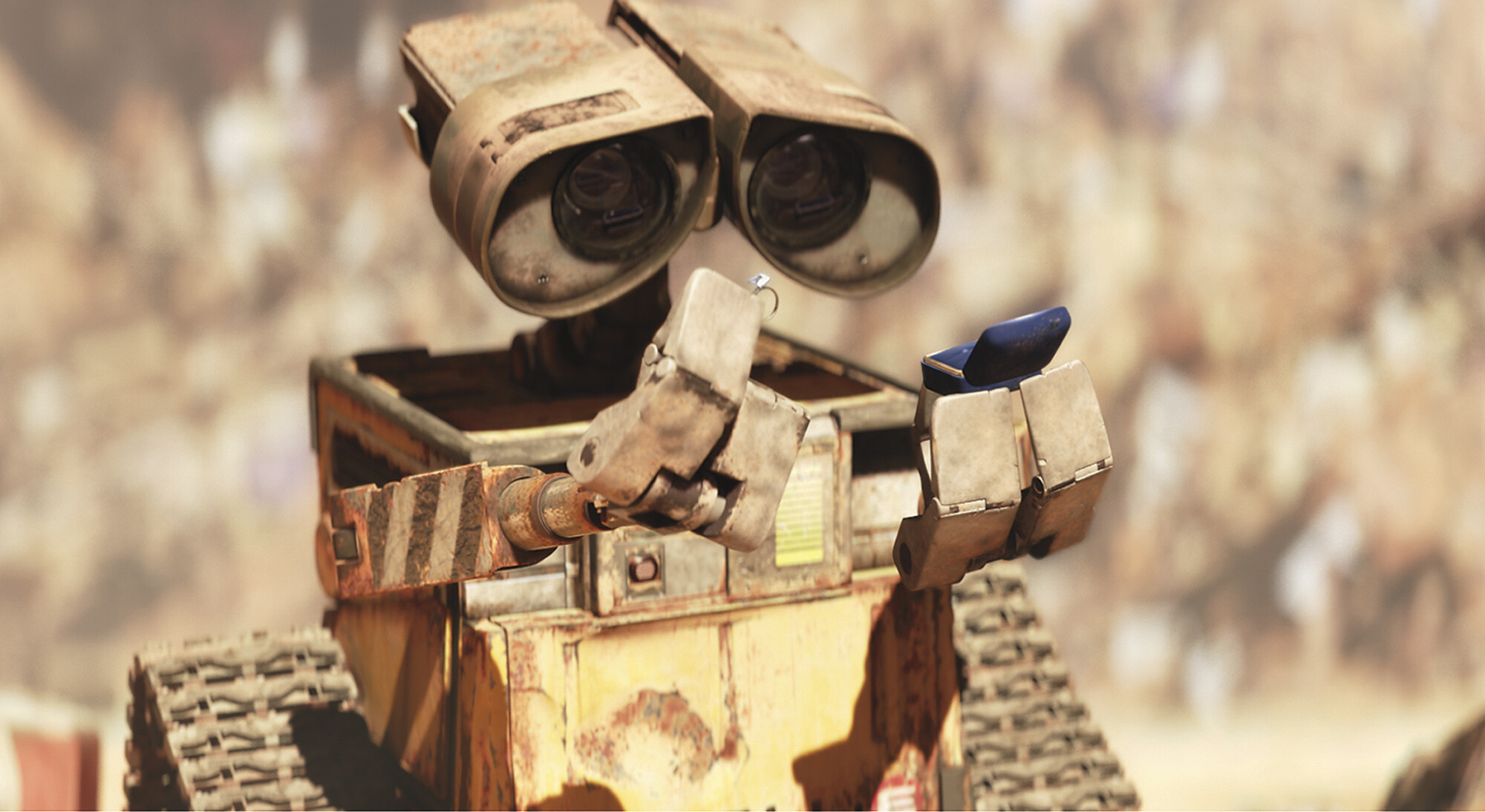 WALL·E: The movie centers around a trash-compacting robot who is tasked with the ungrateful job of cleaning up Earth after humans made it uninhabitable. 2000x1100 HD Background.