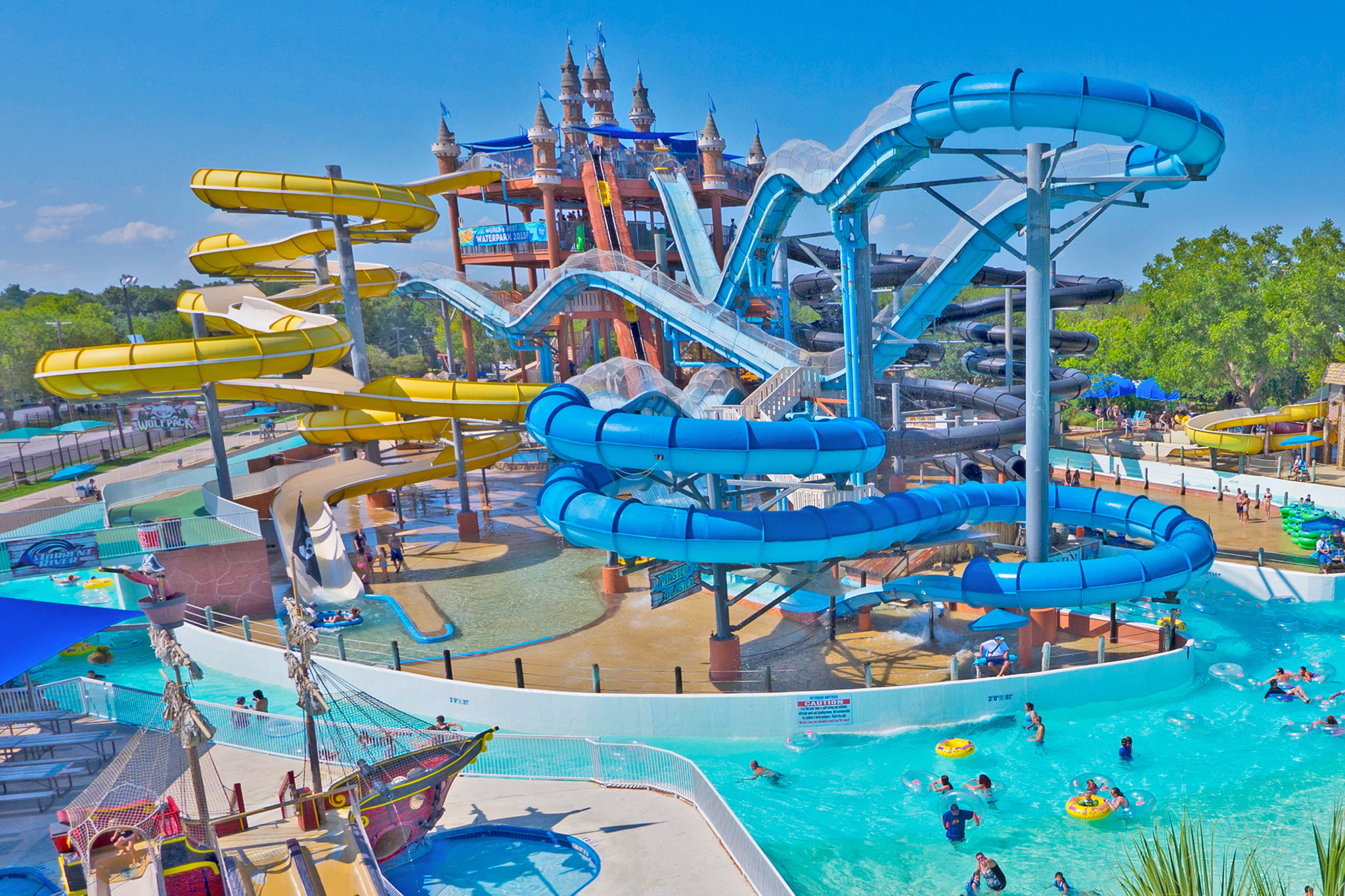Waterpark: Wave pools, Aqua slides and rides, Artificial surfing. 2050x1370 HD Background.