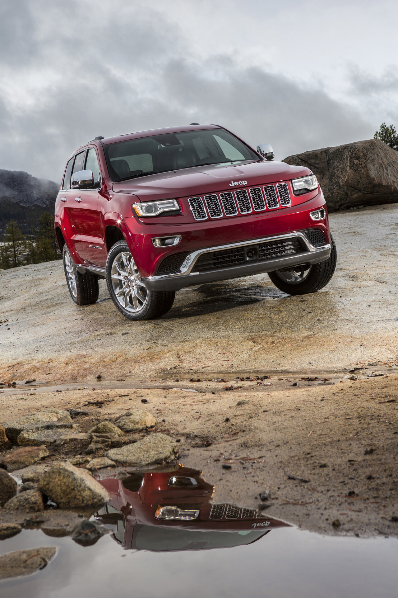 Jeep Grand Cherokee: A range of mid-size SUVs produced by the American manufacturer. 1280x1920 HD Wallpaper.