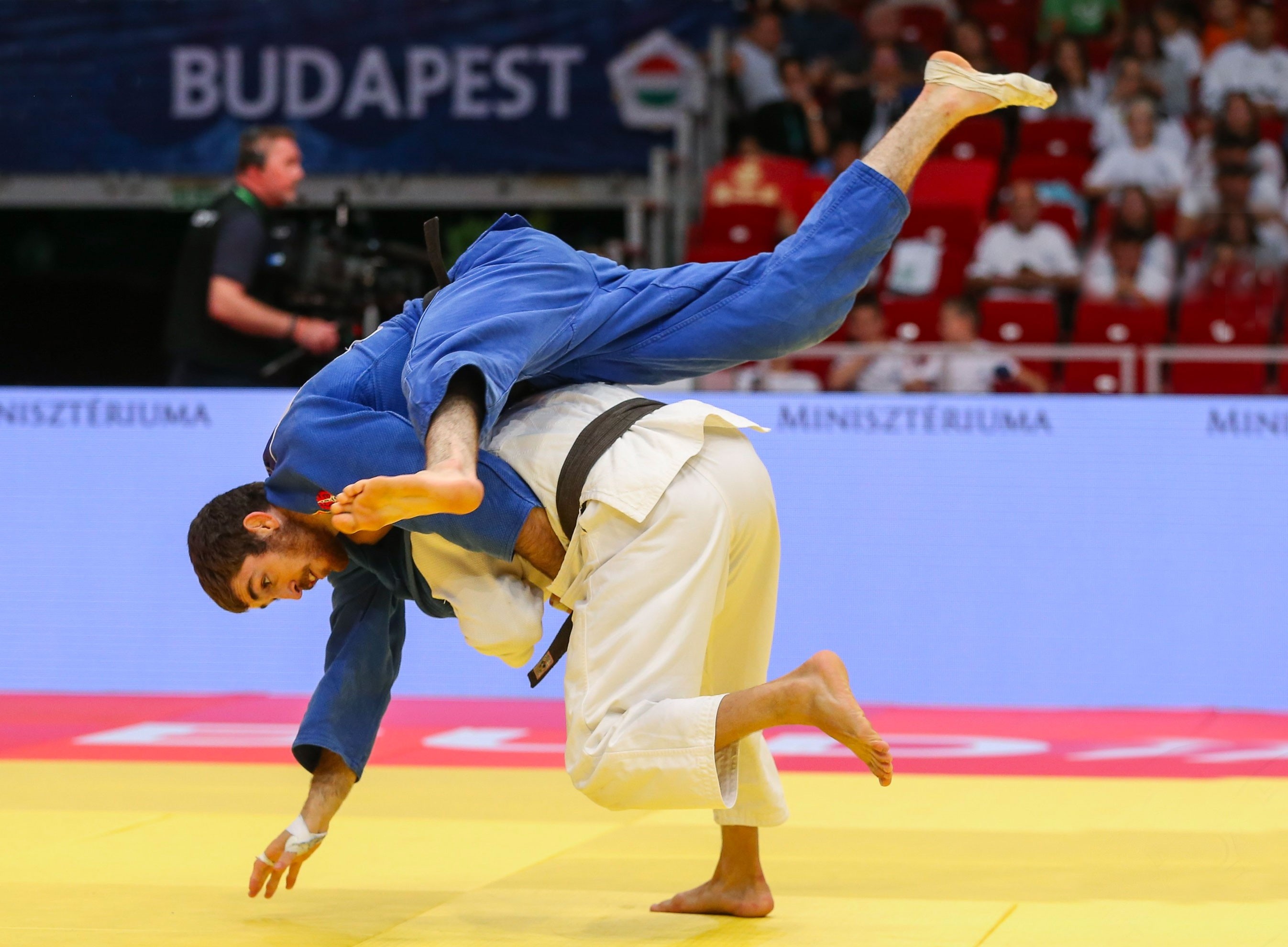 Judo: Competitive ground fighting, World Judo Championships Seniors Hungary 2021. 2700x1980 HD Background.