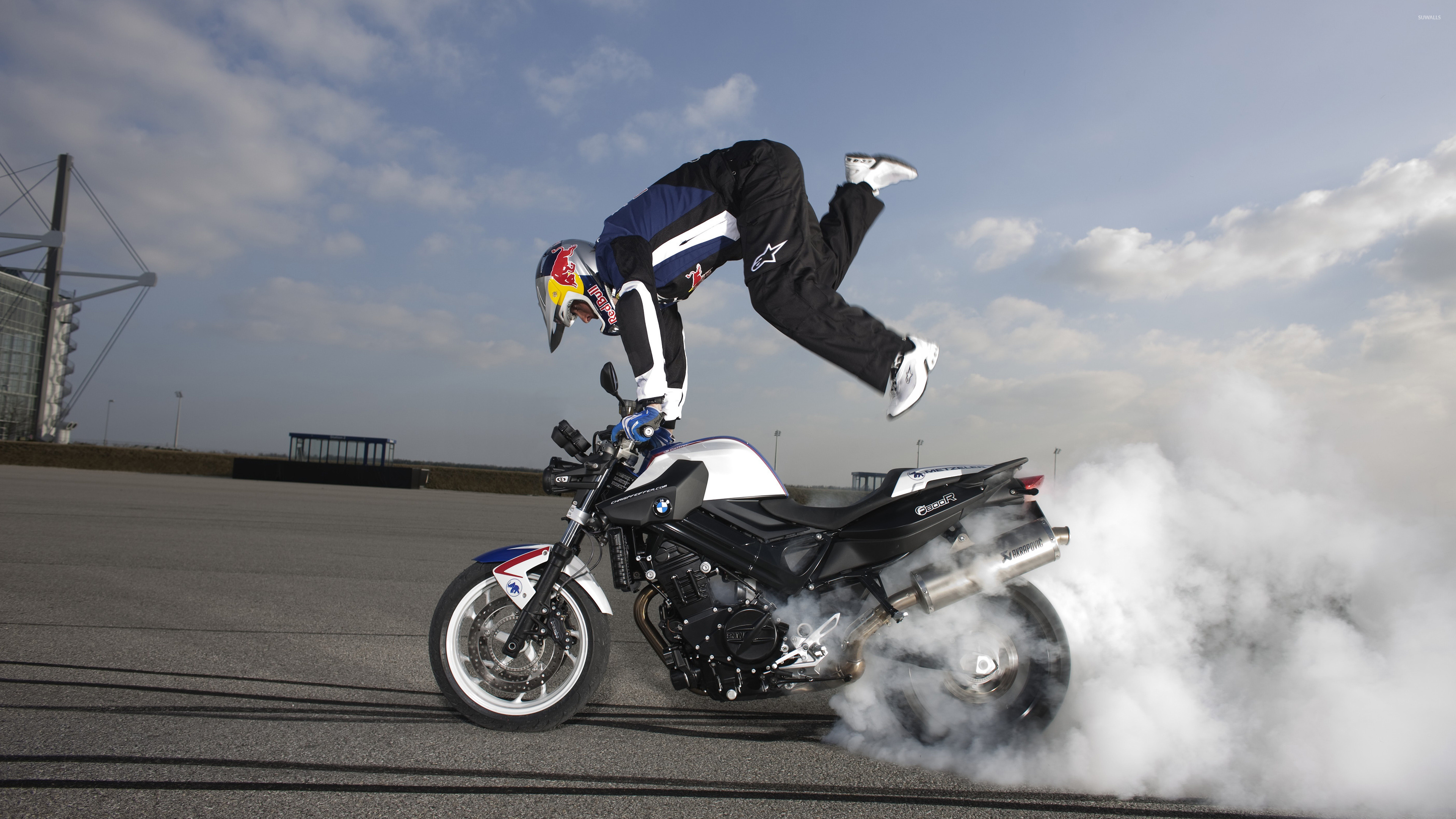 Stunt: Chris Pfeiffer on a BMW F800R, Motorcycle stuntman, Red Bull motorbike stunt riding. 3840x2160 4K Background.