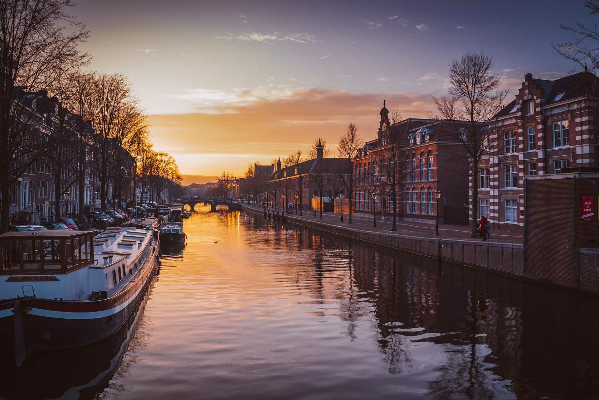 Amsterdam: A beautiful city filled with canals and quirky architecture, Western Europe. 1920x1290 HD Wallpaper.