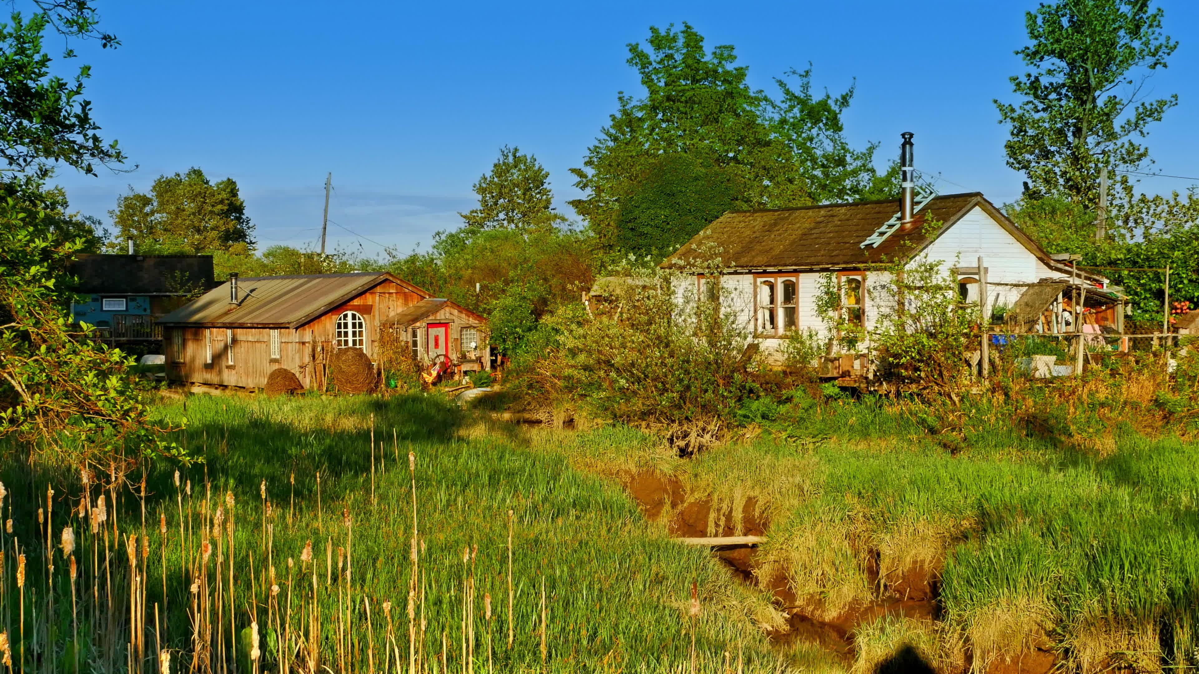 Grassland marsh village, Fishing community simplicity, Tranquil homes, Natural beauty, 3840x2160 4K Desktop
