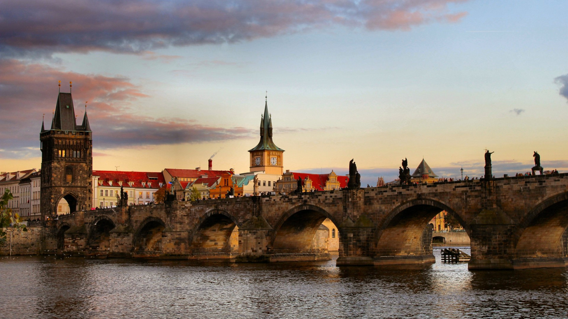 Prague: The Charles Bridge is a historic bridge that spans the Vltava River, Czech Republic. 1920x1080 Full HD Wallpaper.