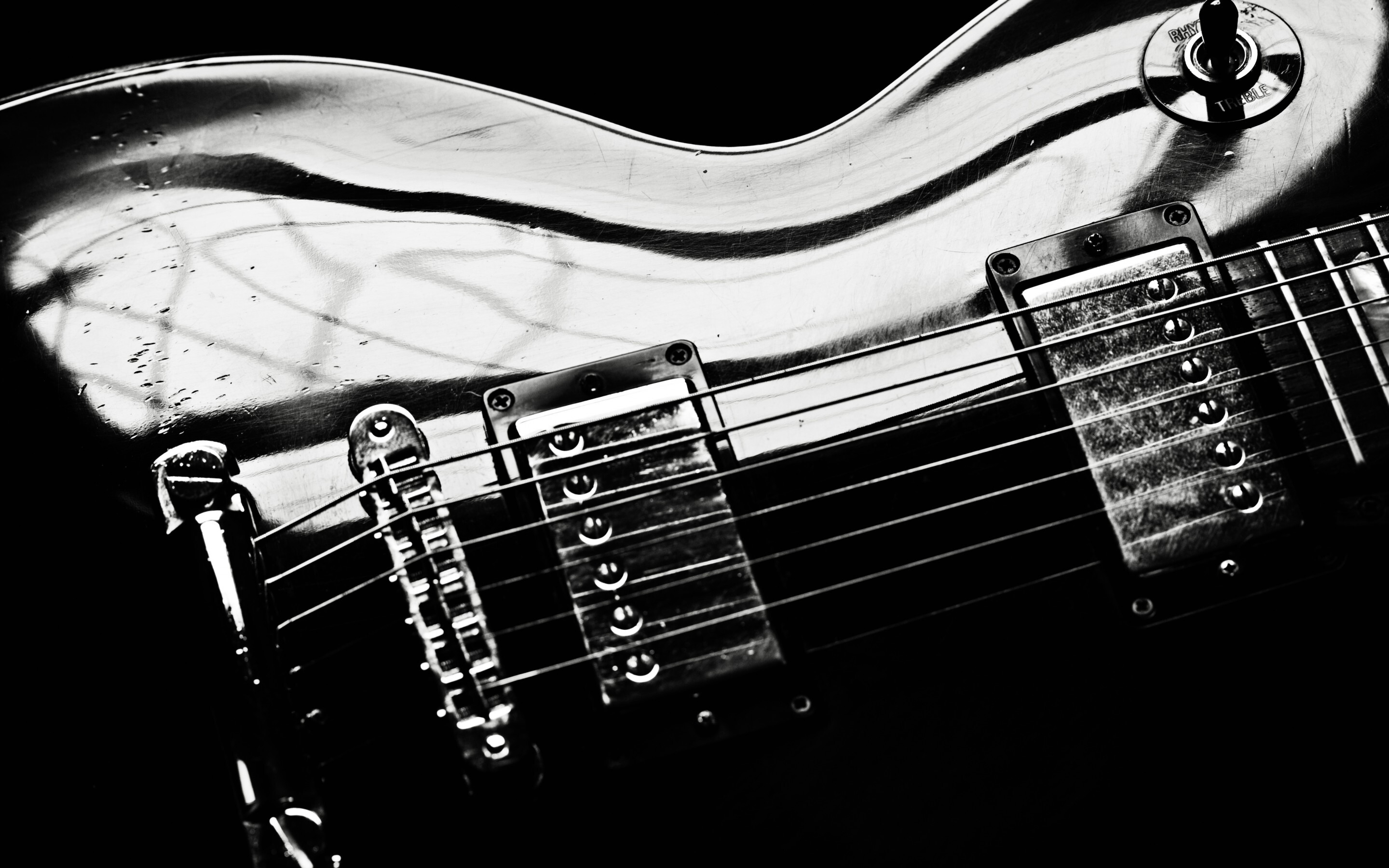 Gibson Guitar: Reflecting Lacquered Top Of The Instrument, A Flat-Bodied Stringed Instrument, Monochrome. 2880x1800 HD Background.