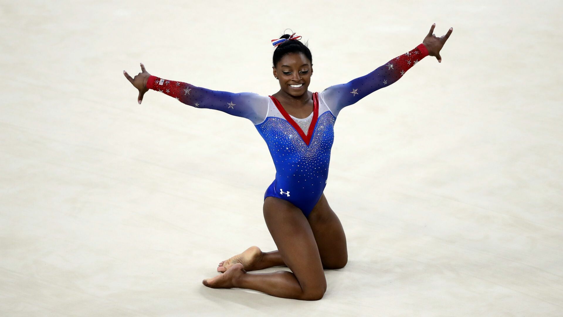 Simone Biles: She was chosen by Team USA to be the flag bearer in the closing ceremonies at Rio 2016 Summer Olympics. 1920x1080 Full HD Background.