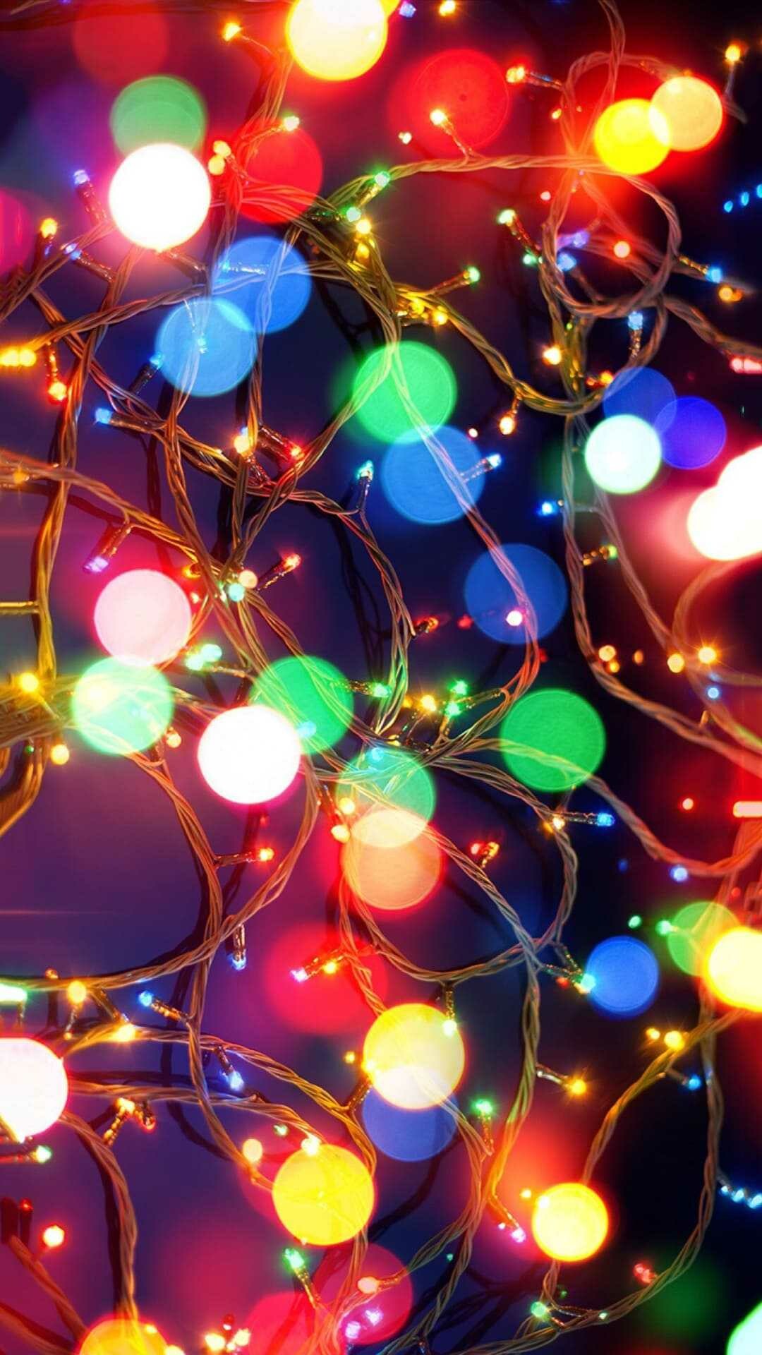 Christmas Lights: Often on display throughout the holiday season including Advent and Christmastide. 1080x1920 Full HD Wallpaper.