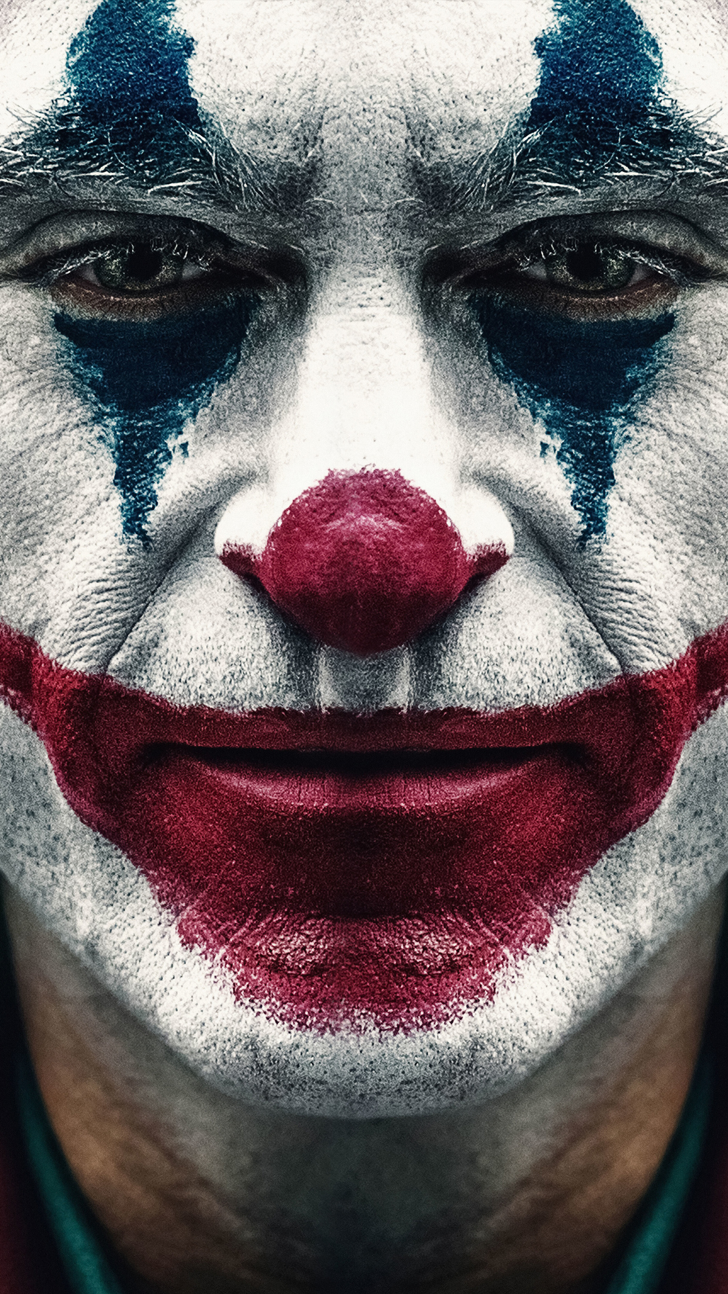 Joaquin Phoenix, Movie Joker, Character transformation, Compelling performance, 1440x2560 HD Phone
