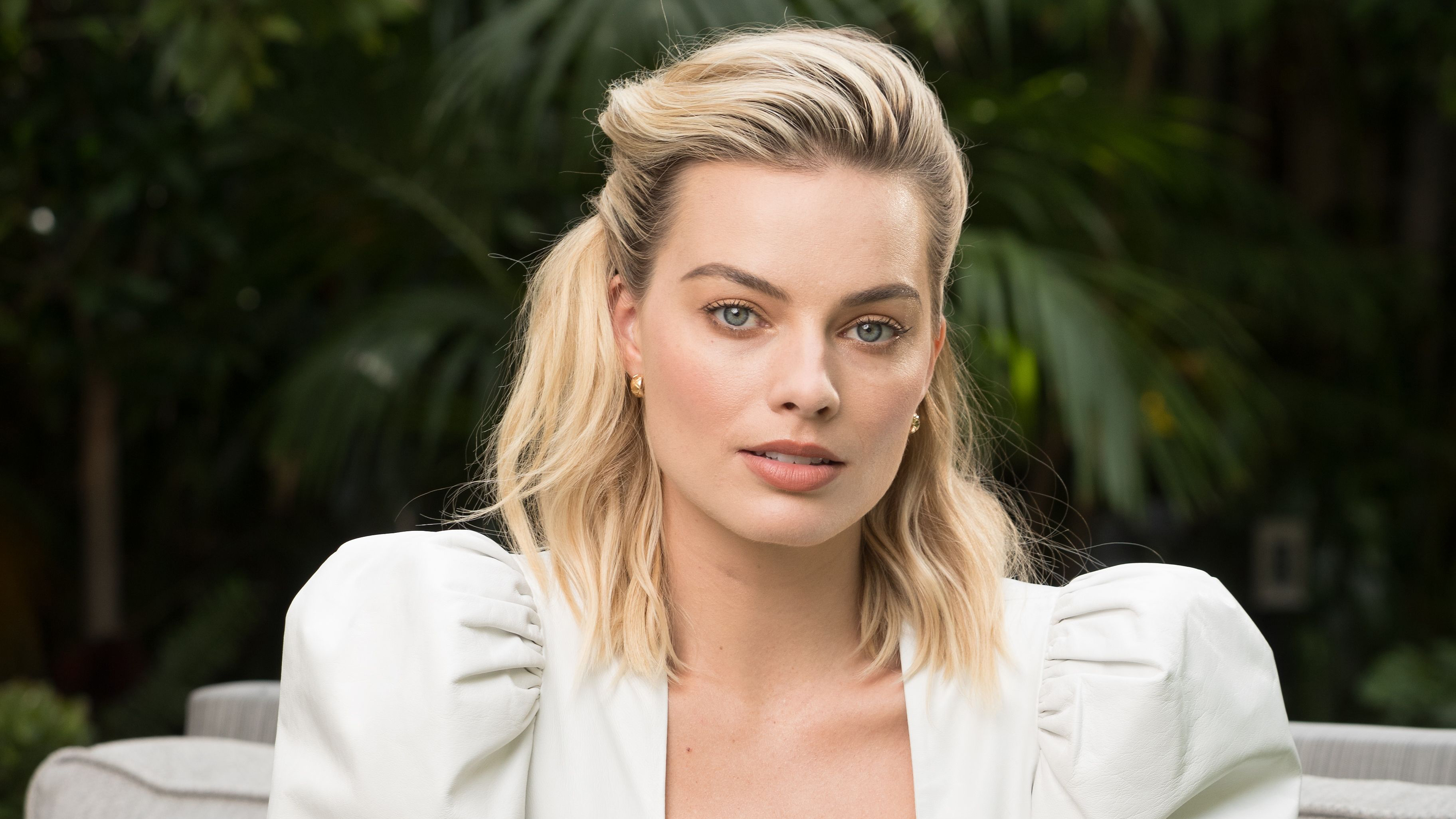 Margot Robbie: The ambassador for brands such as Calvin Klein, Nissan, and Chanel. 3650x2060 HD Background.
