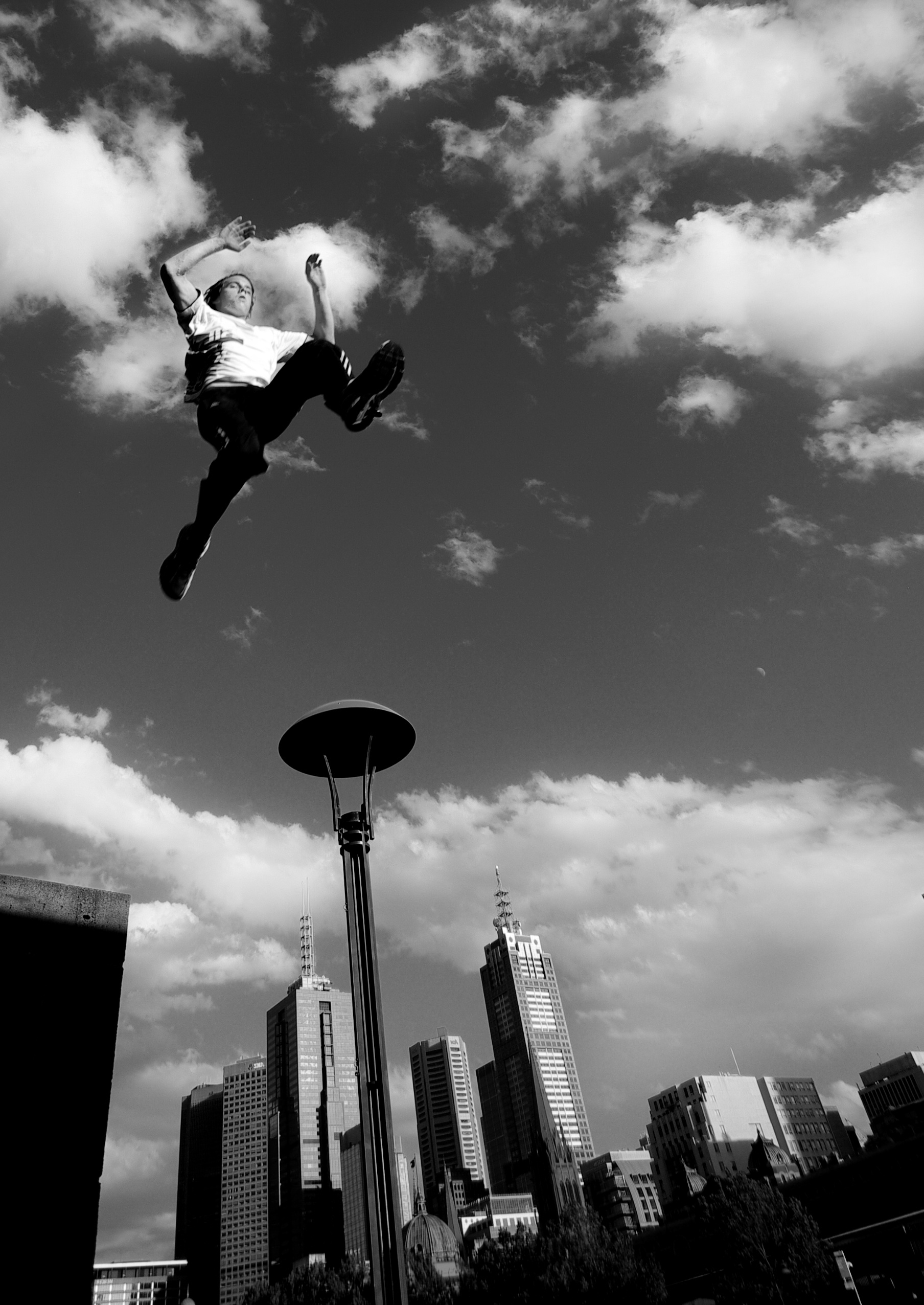 Parkour: Monochrome parkour practitioner, Freedom of movement in the city, Precision jump. 1810x2560 HD Wallpaper.