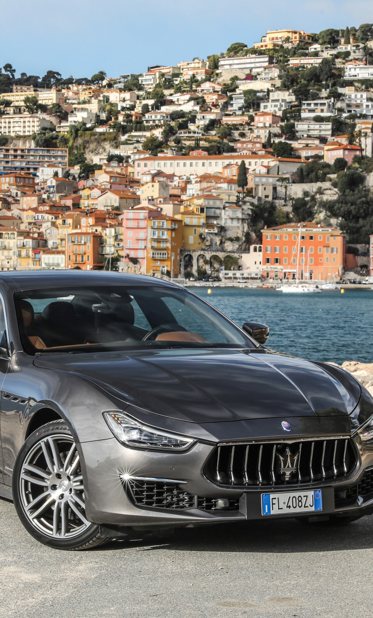 Maserati: The mid-size luxury car segment, The diesel variant in the Ghibli lineup. 1280x2120 HD Background.