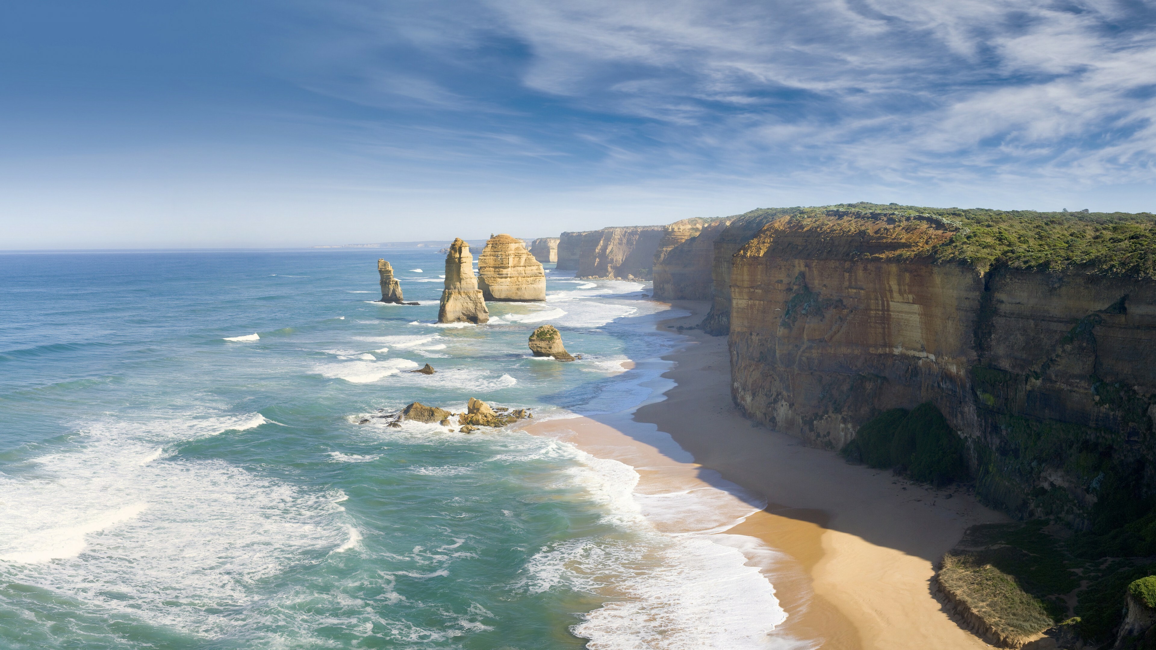 Australia: The Twelve Apostles, A collection of limestone stacks off the shore of Port Campbell National Park, Victoria. 3840x2160 4K Background.