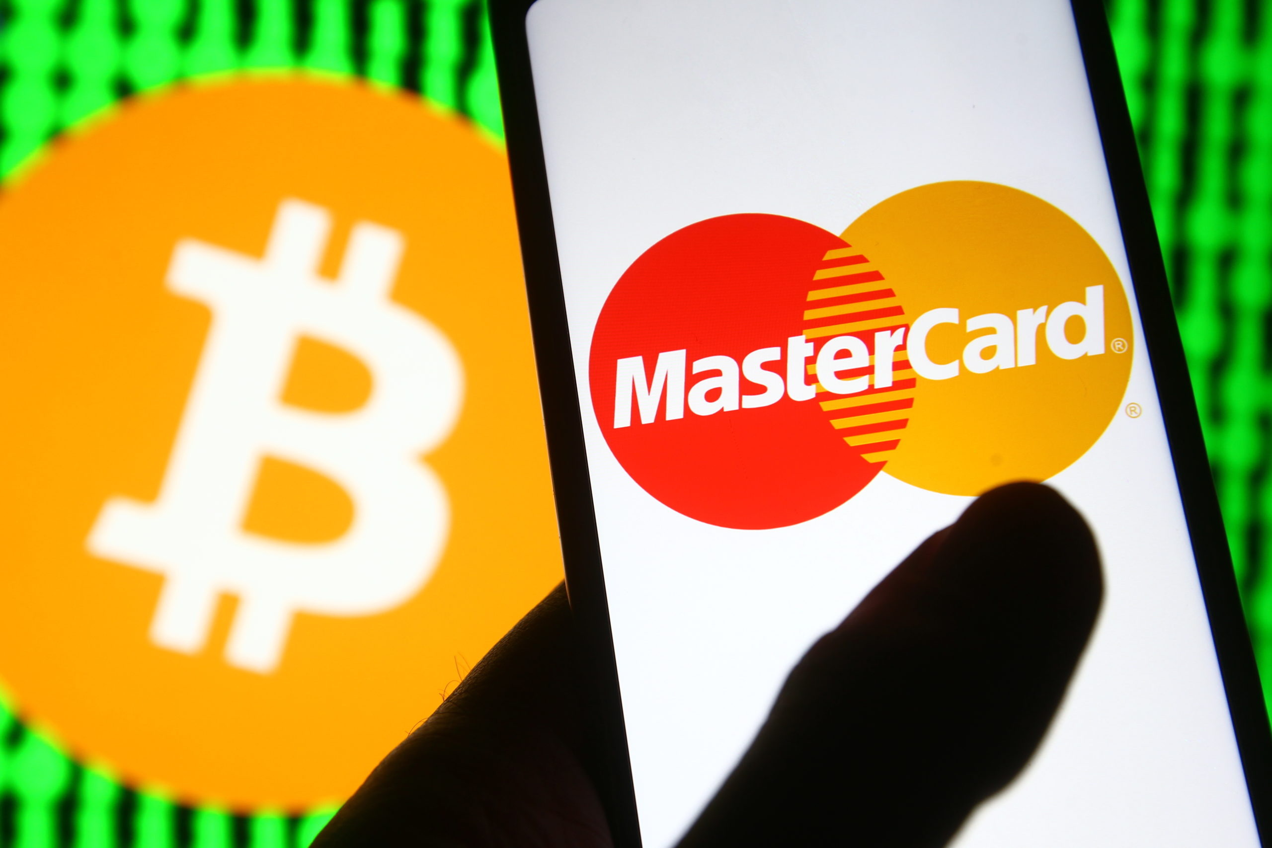 Mastercard: A bank card, Bitcoin, Cryptocurrency, Payment method. 2560x1710 HD Background.