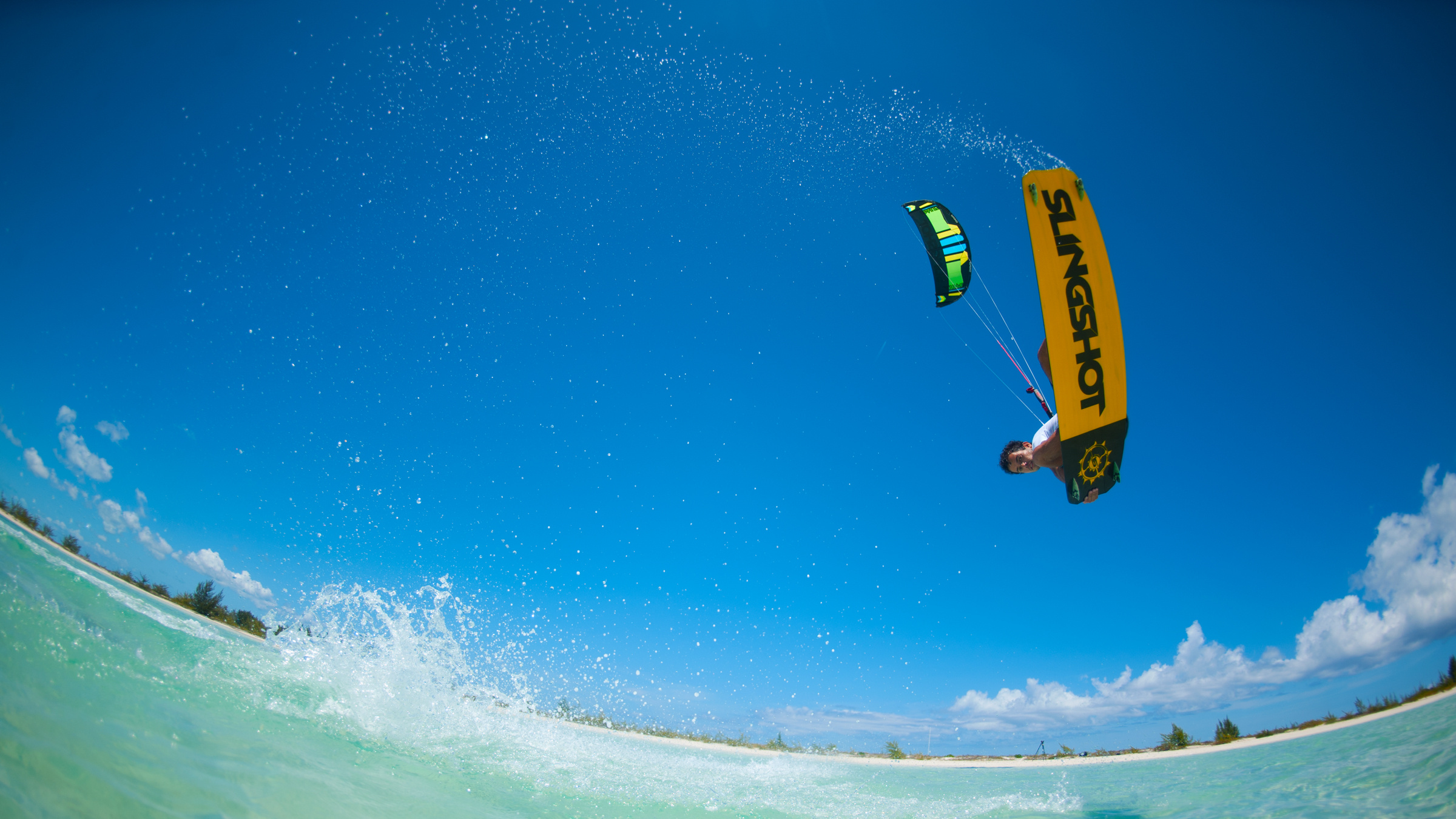 Slingshot kiteboarding wallpaper, High-flying jumps, Pro rider style, HD kiteboarding shots, 2400x1350 HD Desktop