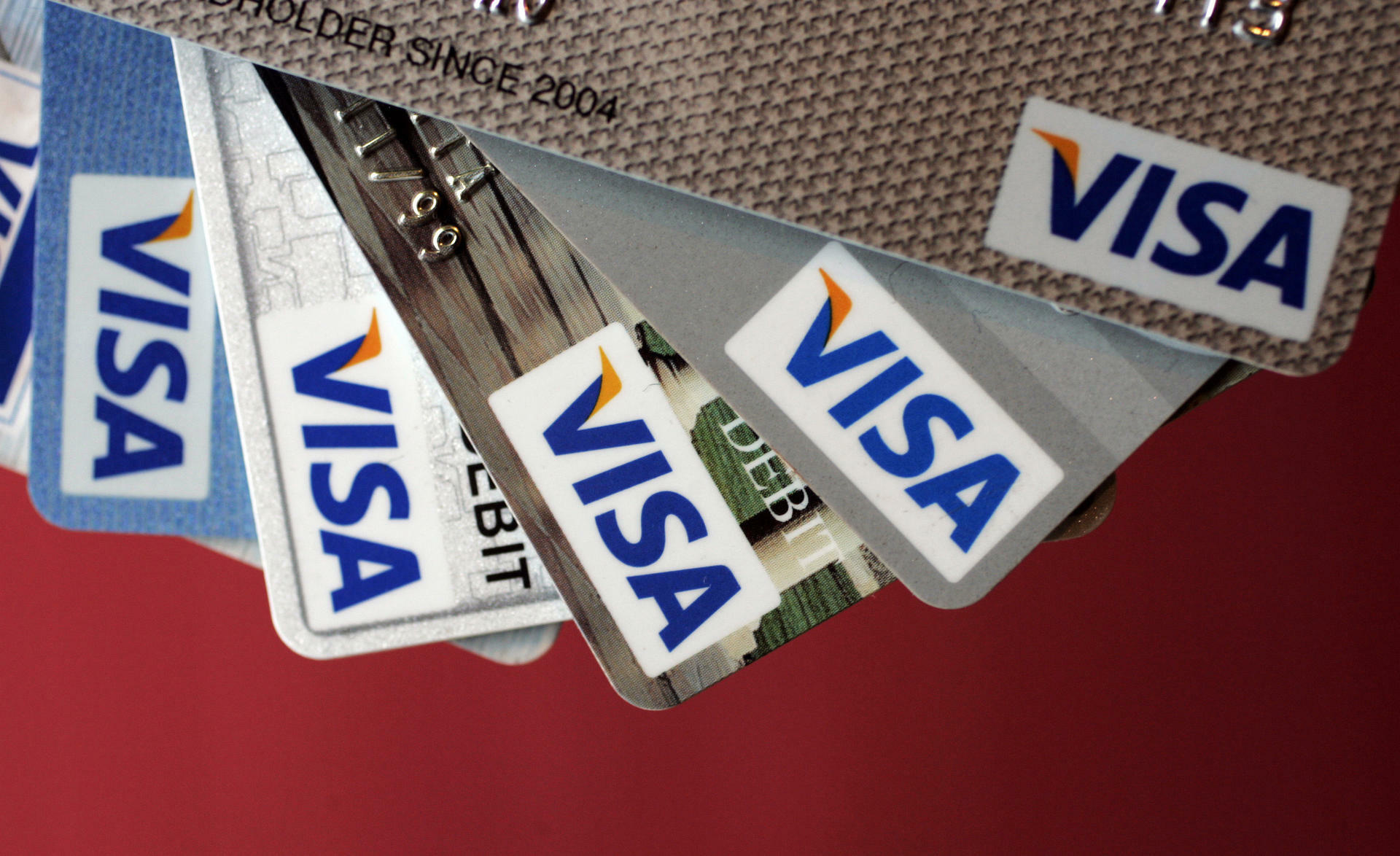Visa (Card): The company facilitates electronic funds transfers throughout the world. 1920x1180 HD Background.