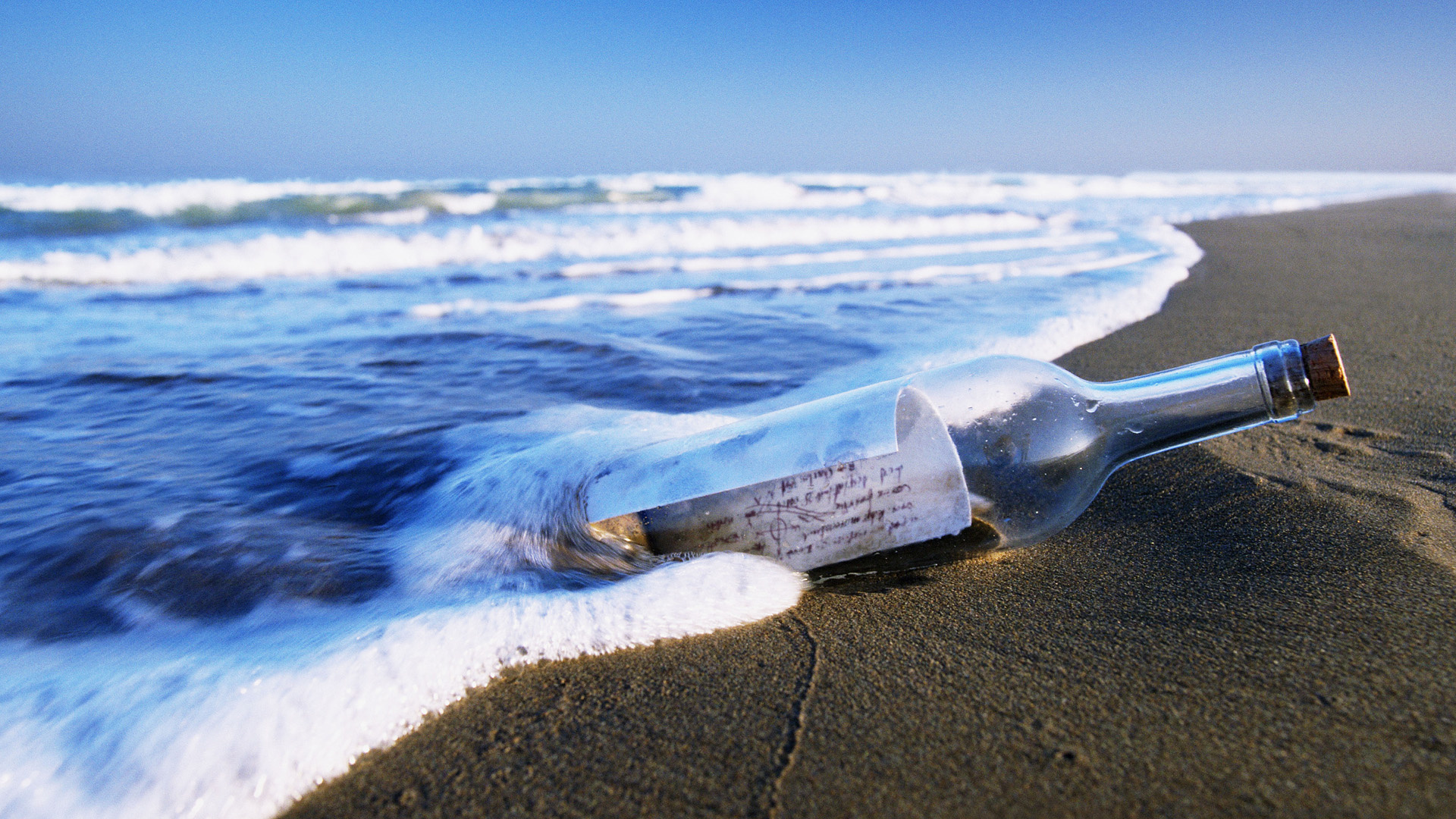 Message in a Bottle: A way to express grief and remember a person who has passed away. 1920x1080 Full HD Background.