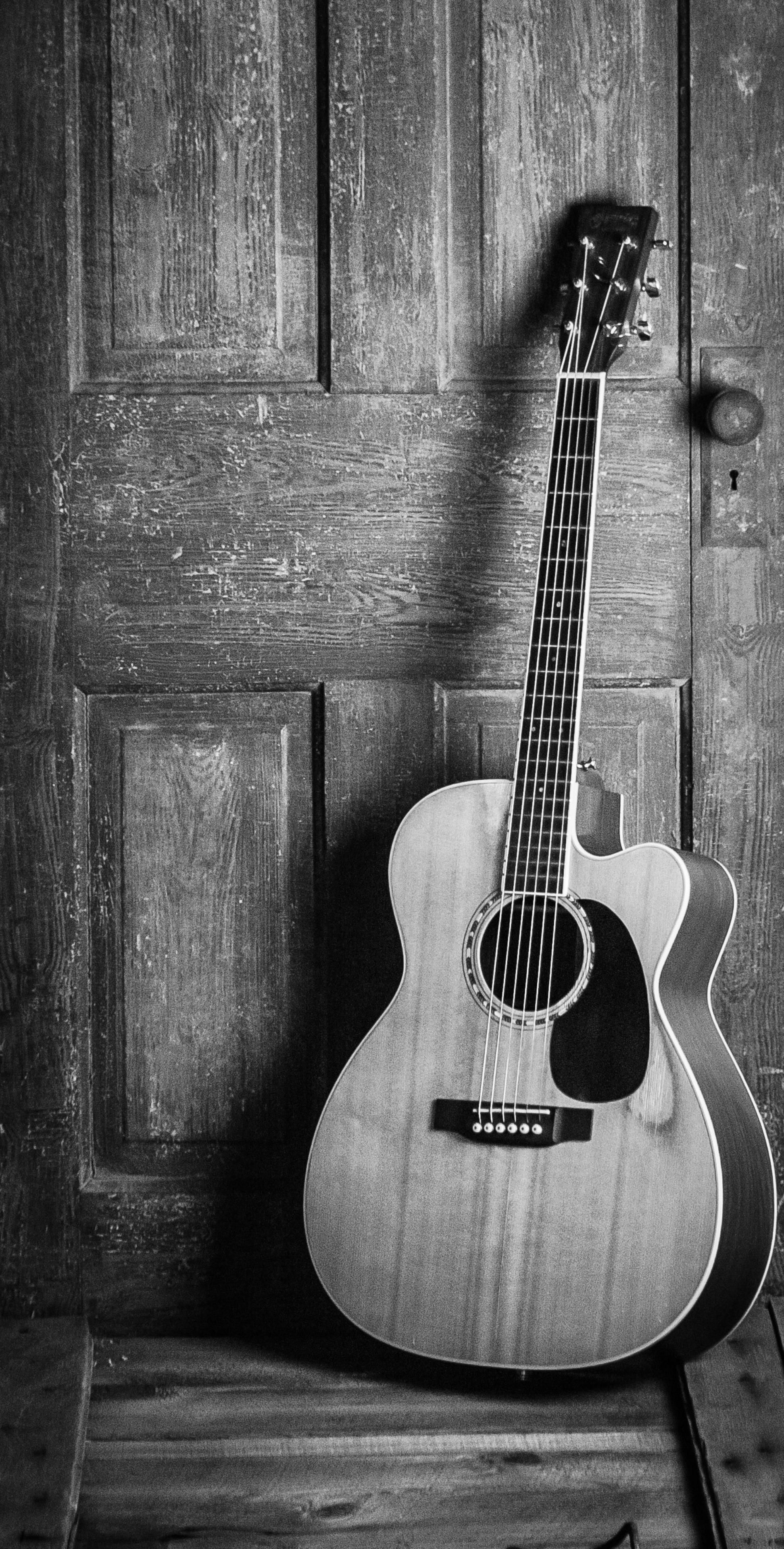 Guitar: Black-and-white, Wooden instrument, The sound is projected either acoustically or amplified by an electronic pickup and an amplifier. 1950x3840 HD Wallpaper.