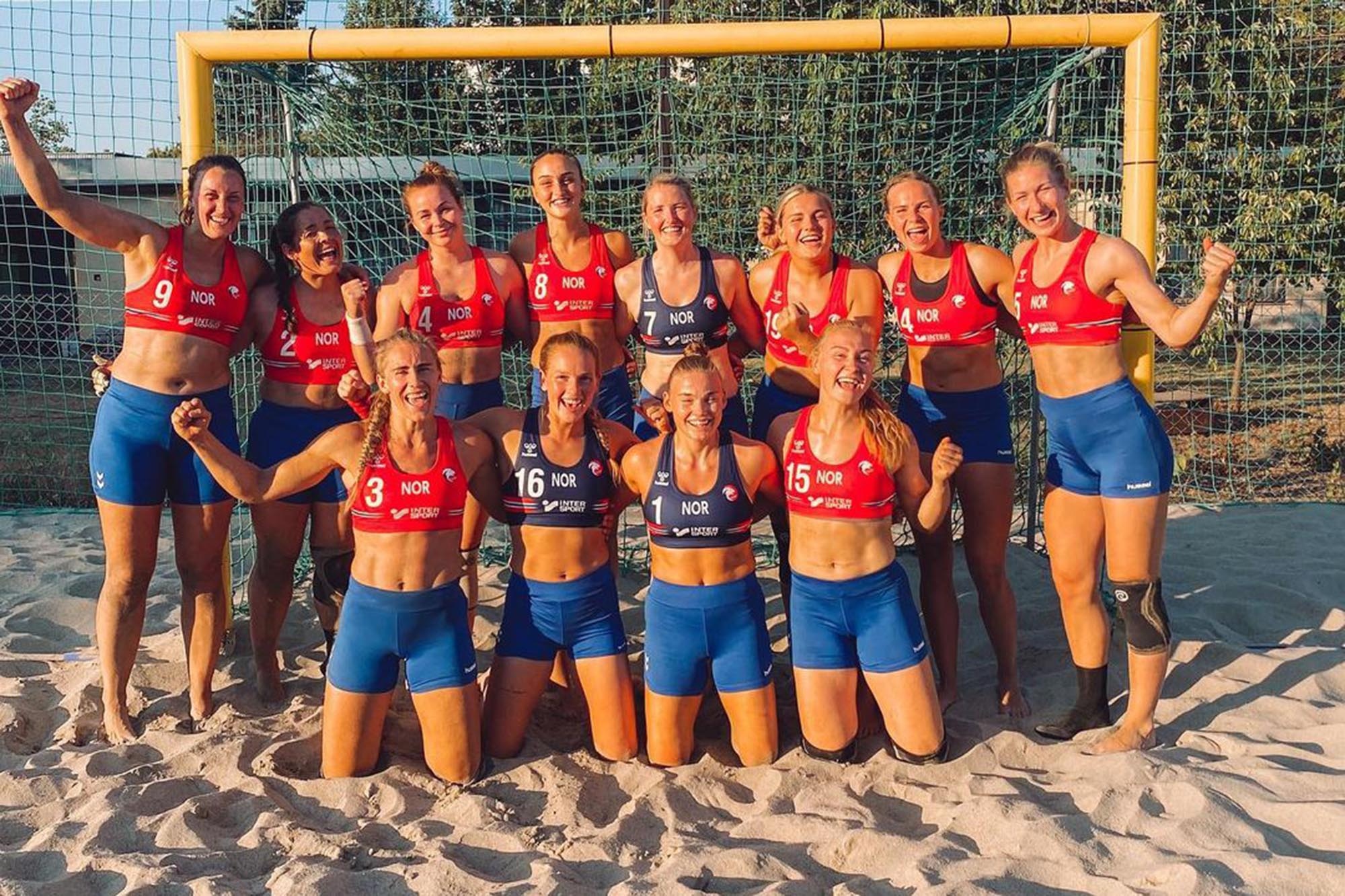 Beach Handball: Norwegian women's team wearing shorts during the match against Spain in 2021. 2000x1340 HD Background.