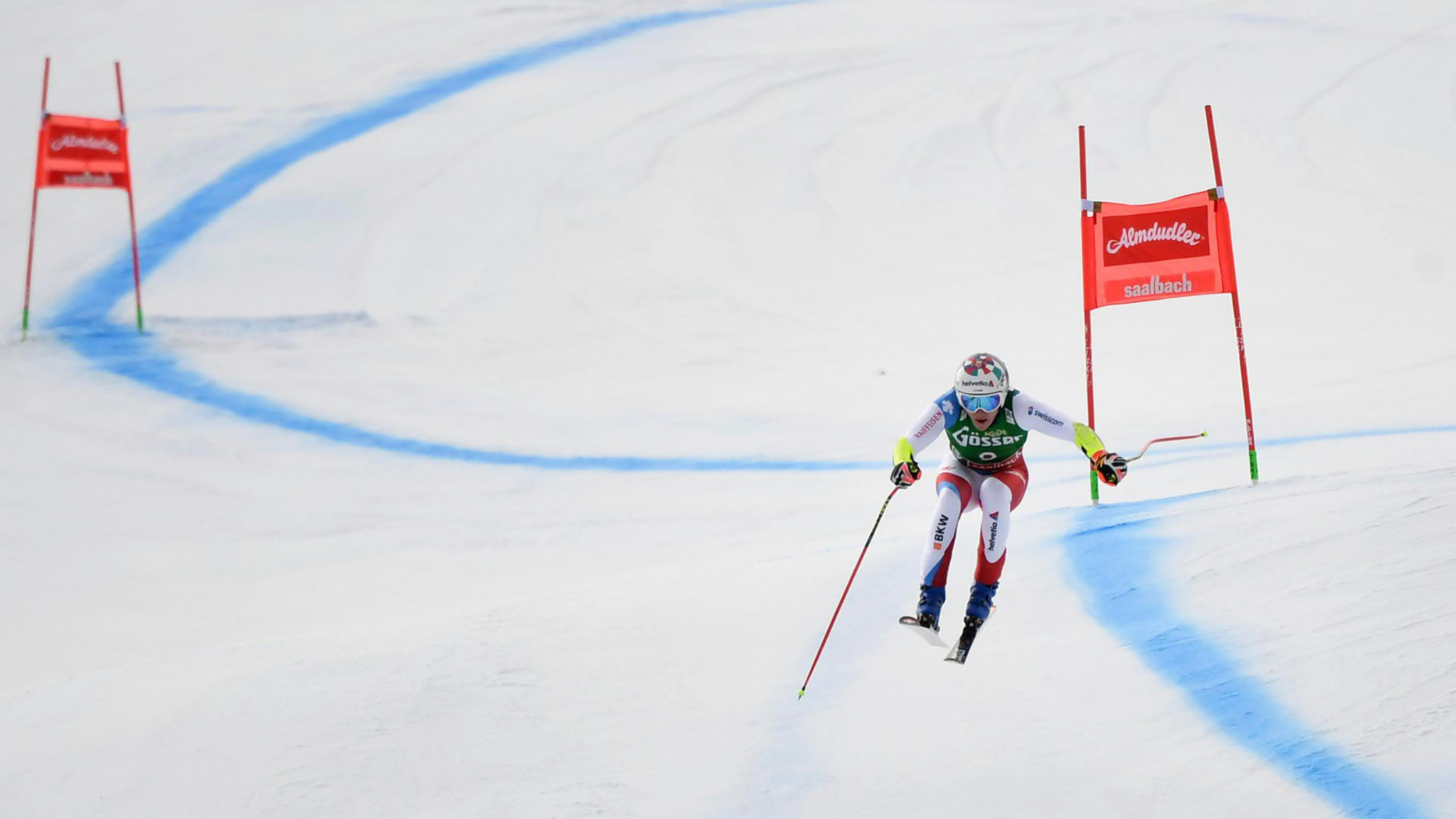Alpine Skiing: Marco Odermatt, FIS Alpine Skiing World Cup, Super-G in Saalbach, Cyclic winter sports. 2050x1160 HD Wallpaper.