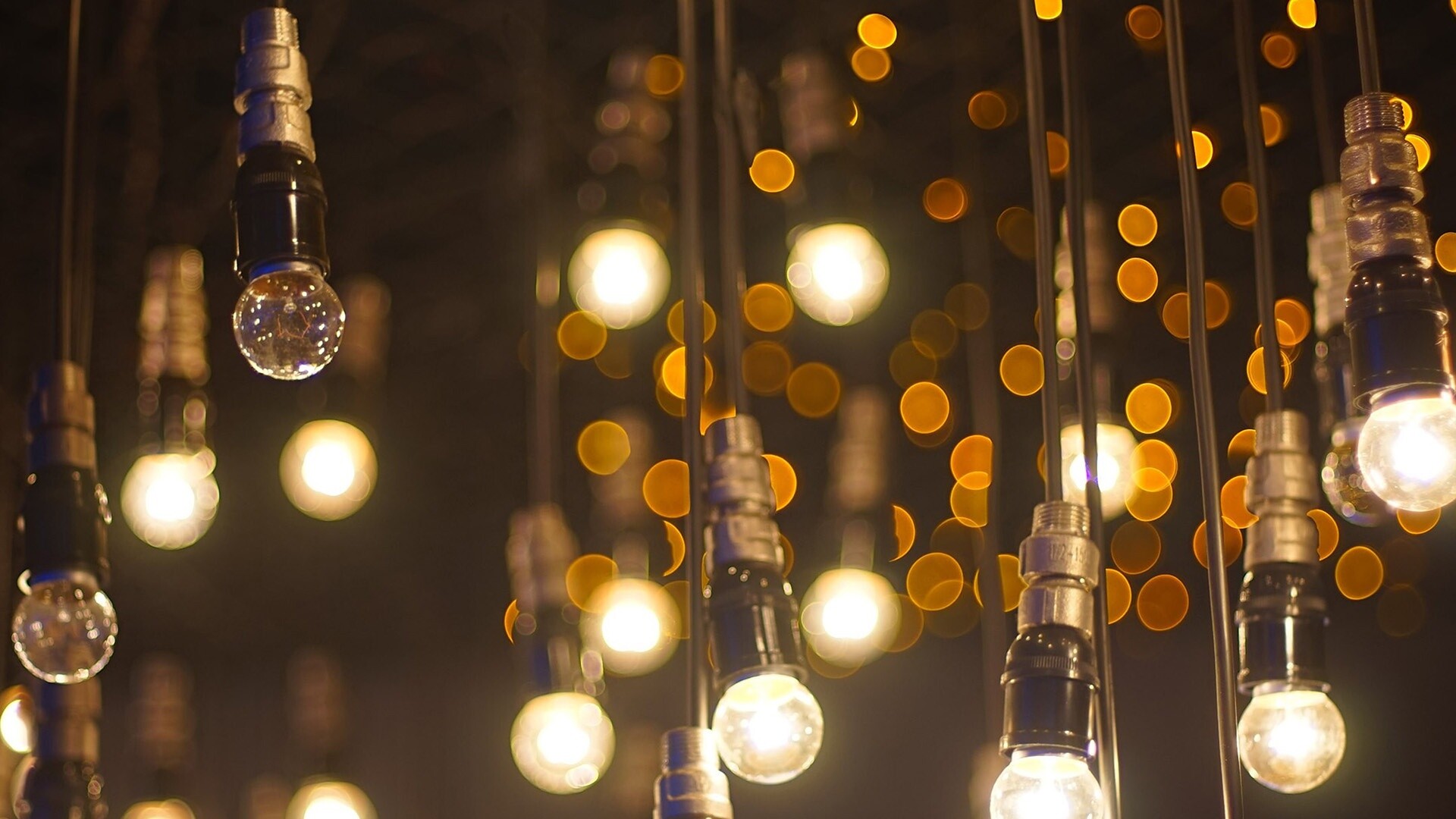 Gold Lights: Decorative vintage Edison bulbs with cord, The clear glass bulb, Retro styling, Out-of-focus blurred lights. 1920x1080 Full HD Wallpaper.