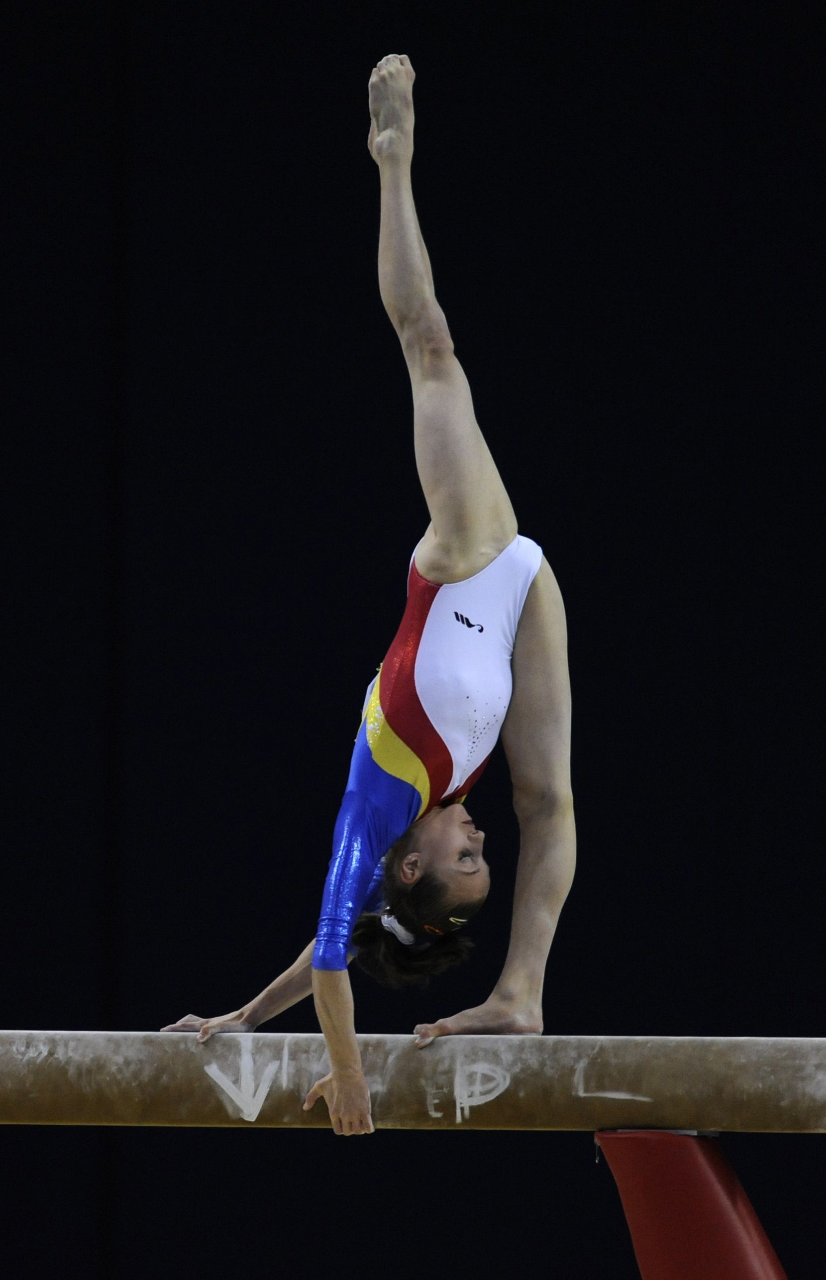 Acrobatic Sports: Ana Porgras, A Romanian former artistic gymnast, BB gold medal, 2010. 1660x2580 HD Background.