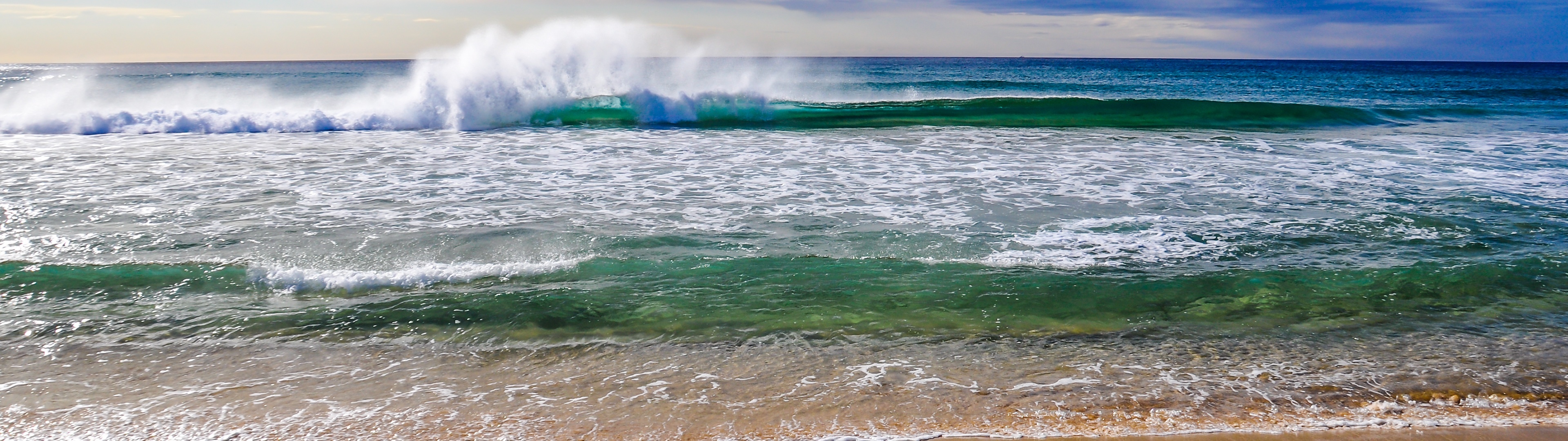 Seascape: Coastal waters, Small waves, A good place for surfing, The ocean beach. 3840x1080 Dual Screen Background.