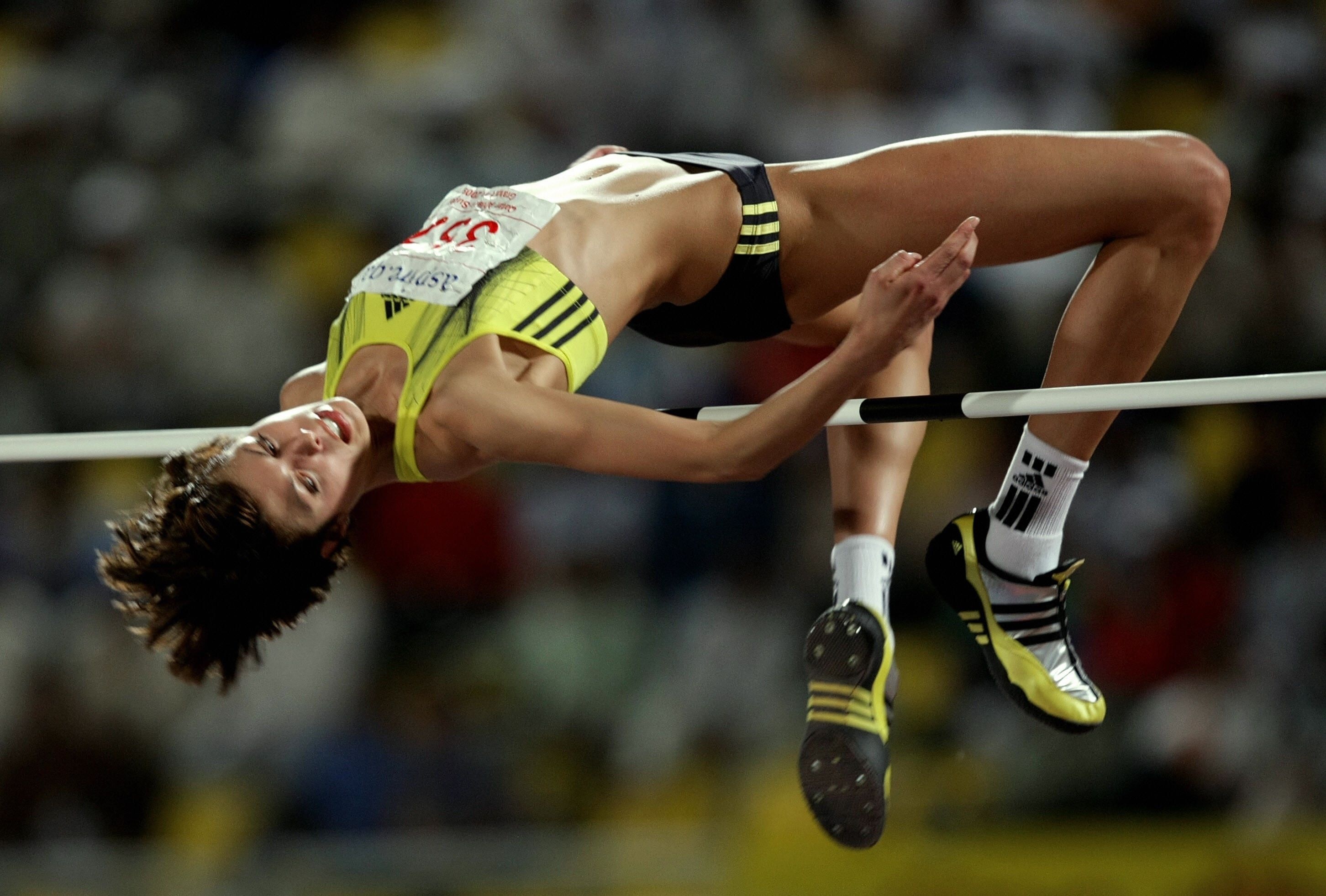 High Jump: Blanka Vlasic, A leap for height made from a running start, Track and field athletics. 2910x1970 HD Wallpaper.