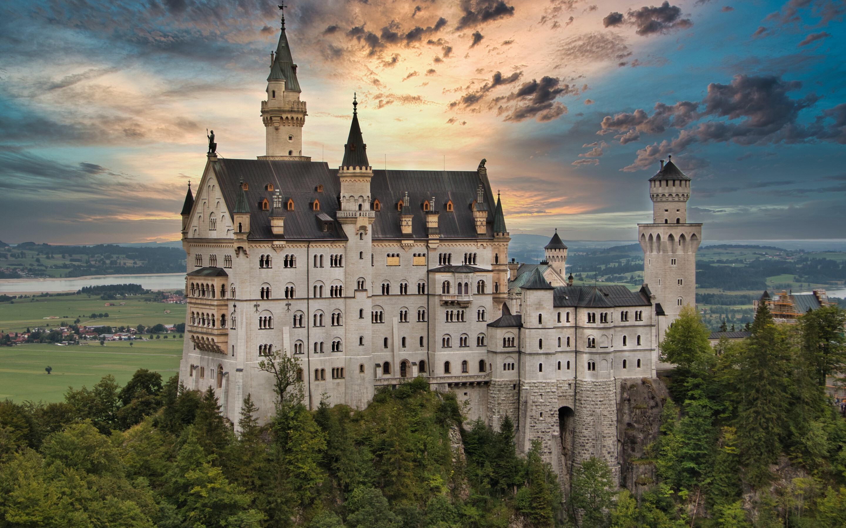 Neuschwanstein Castle: A monument to medieval culture and kingship, Bavaria, Germany. 2880x1800 HD Wallpaper.