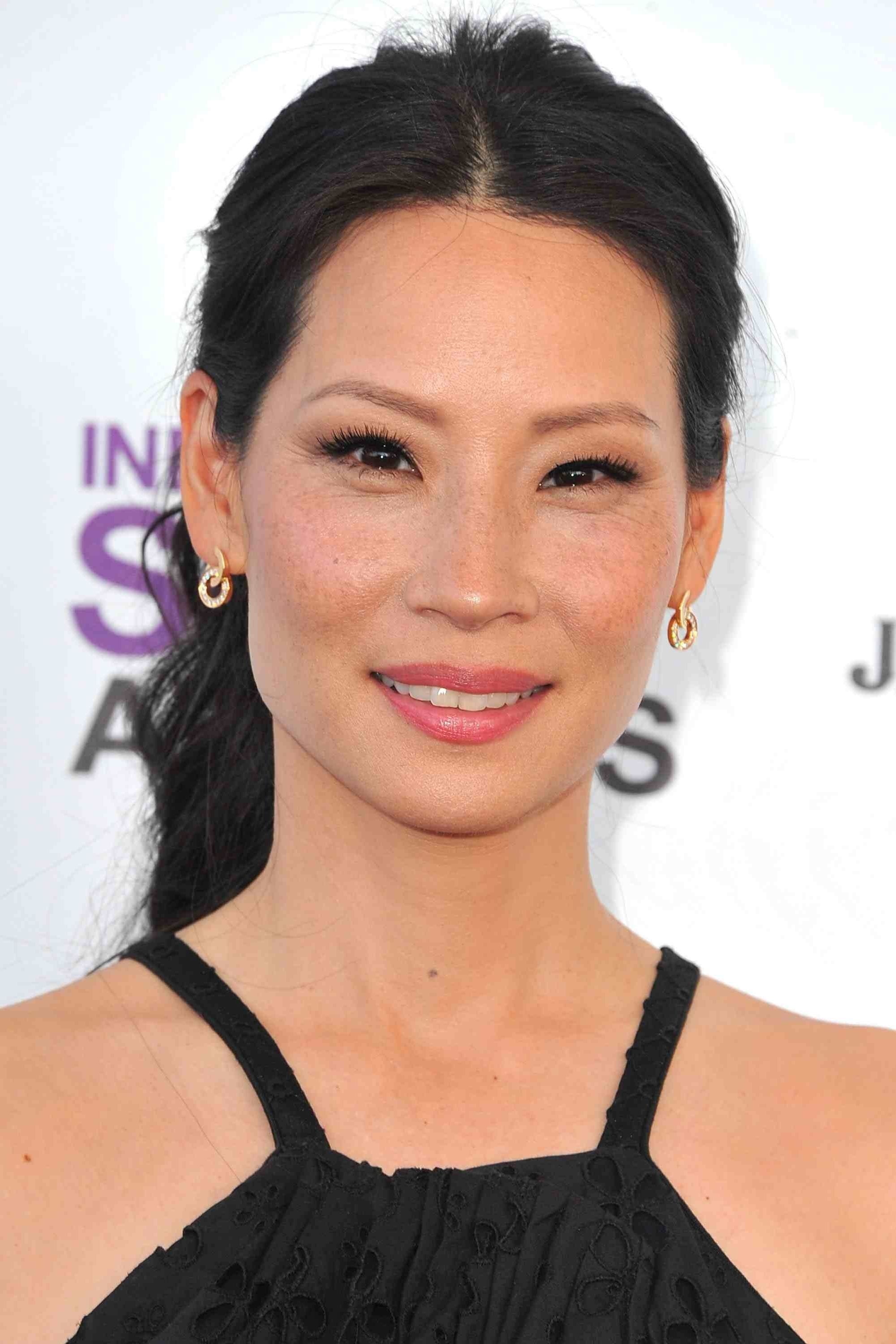 Lucy Liu: The face of the Lee National Denim Day campaign, 2001. 2000x3000 HD Background.