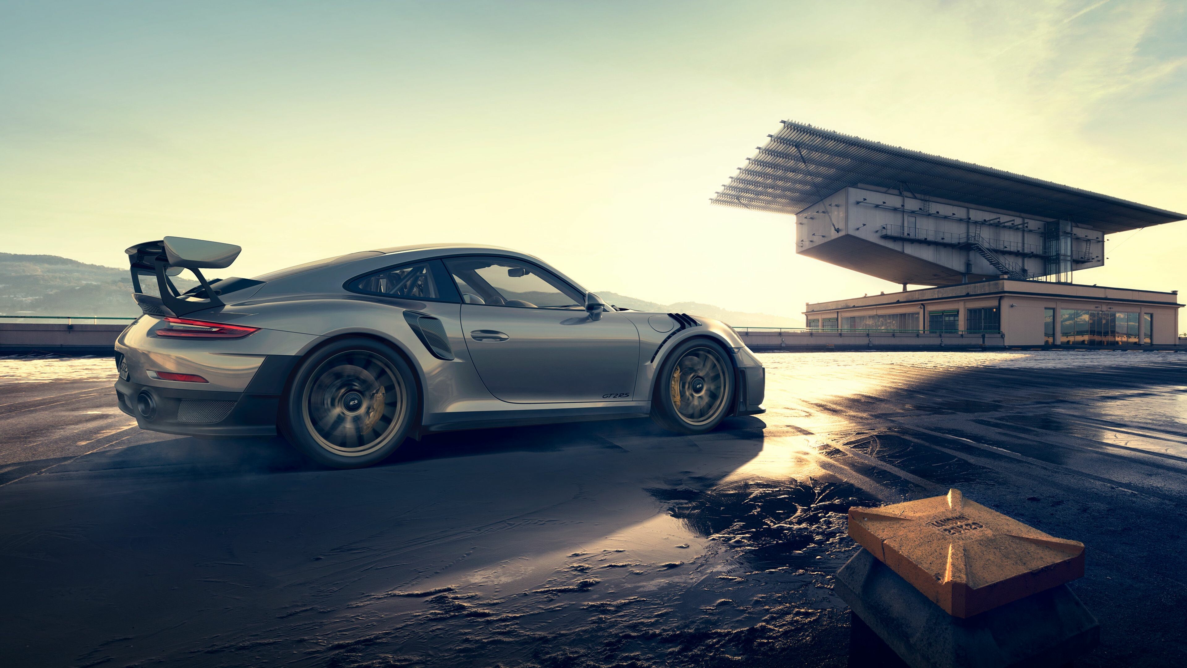 Porsche: GT2, It is based on the 911 Turbo, and uses a similar twin-turbocharged engine, but features numerous upgrades, including engine enhancements, larger brakes, and stiffer suspension calibration. 3840x2160 4K Wallpaper.